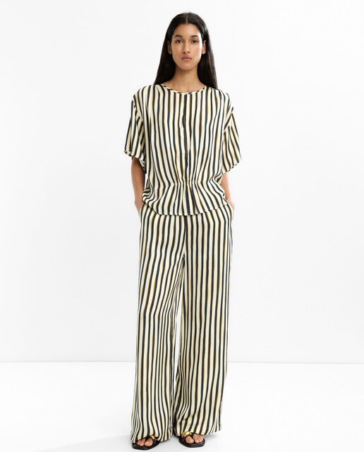 Imagen 0 de Pantalón fluido de mujer satinado con estampado de rayas