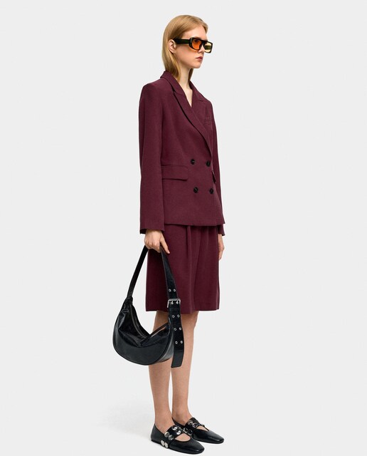 Imagen 0 de Bermuda de mujer de pinzas en parte delantera lisa