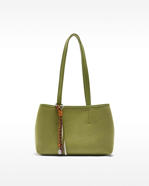 Imagen 0 de Bolso de mano estilo tote con varios compartimentos y llavero extraíble con cierre de cremallera