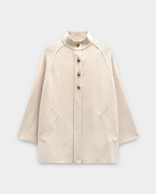 Imagen 0 de Poncho de mujer de punto con cuello alto y botones