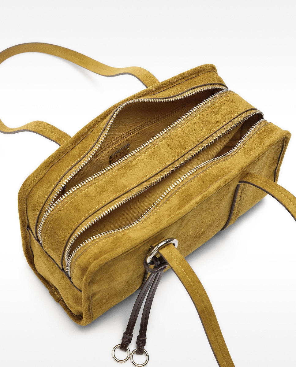 Bolso de hombro estilo bowling con varios compartimentos y cierre