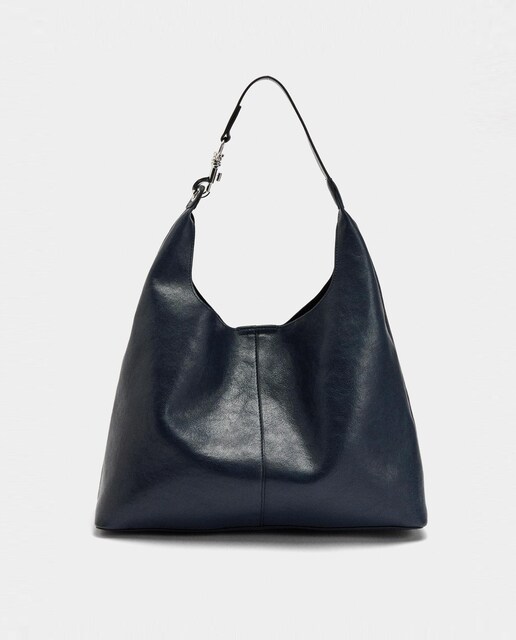 Imagen 0 de Bolso de hombro estilo hobo con cierre de imán en liso