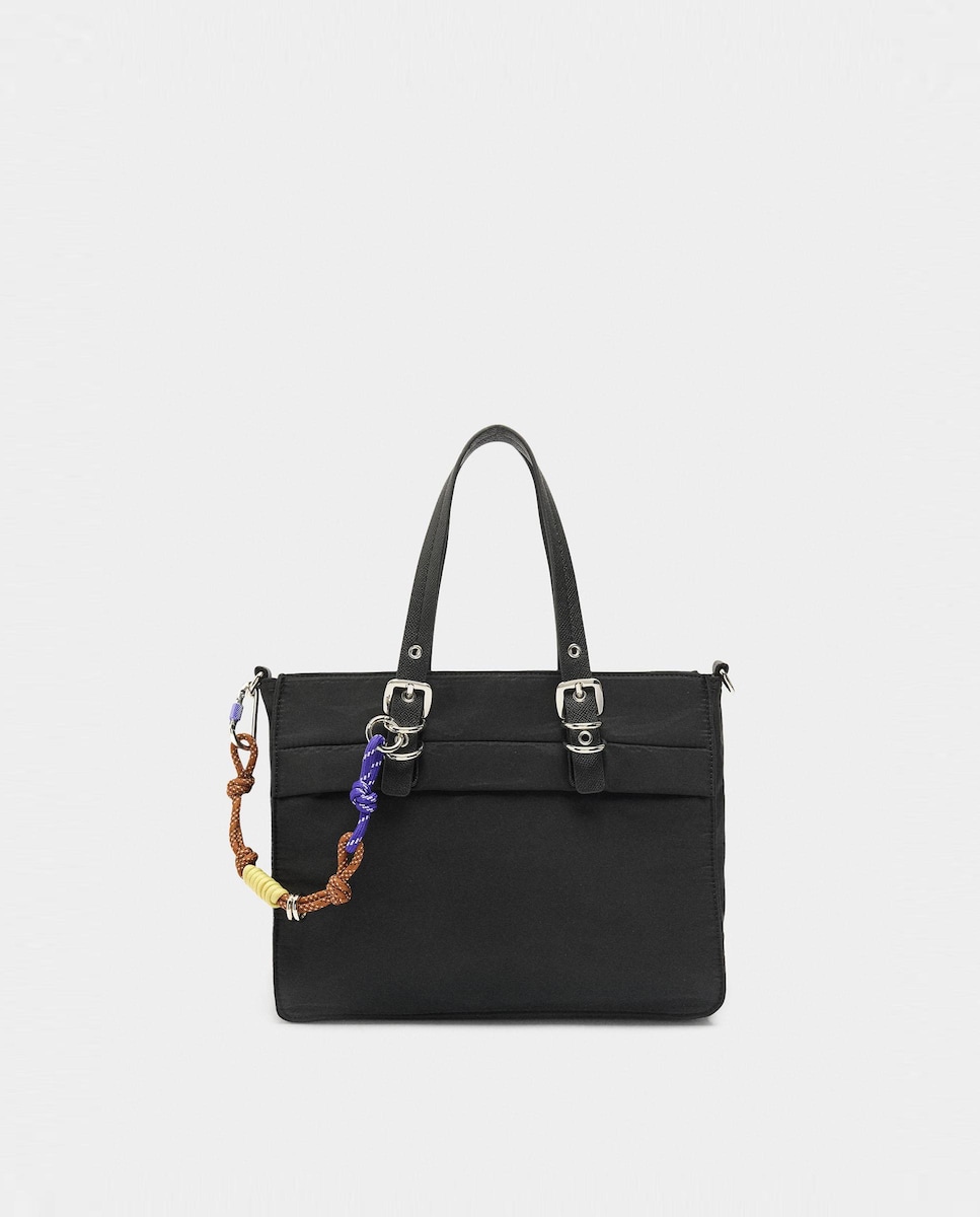Bolso de mano estilo tote convertible a bandolera con cierre de