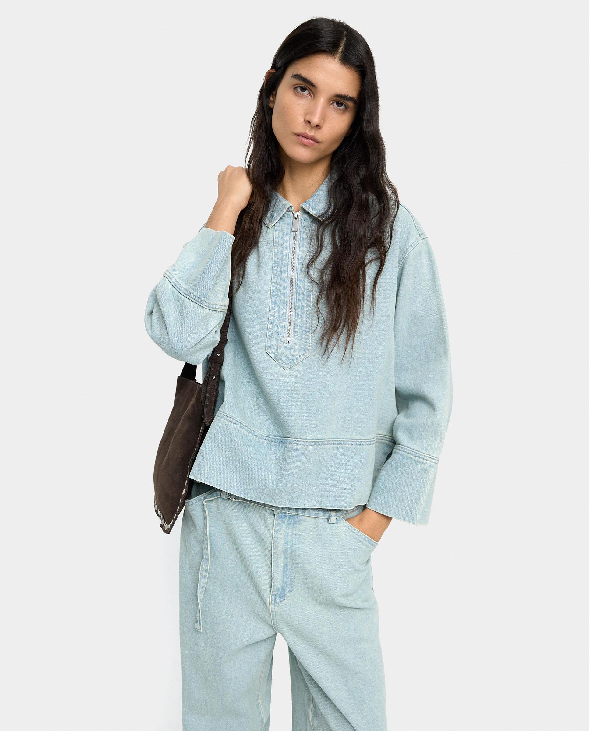 Parfois - Camisa de mujer vaquera con cuello polo y cremallera.