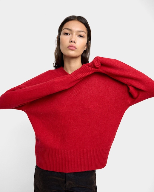 Imagen 0 de Jersey de mujer de punto con cuello pico en liso