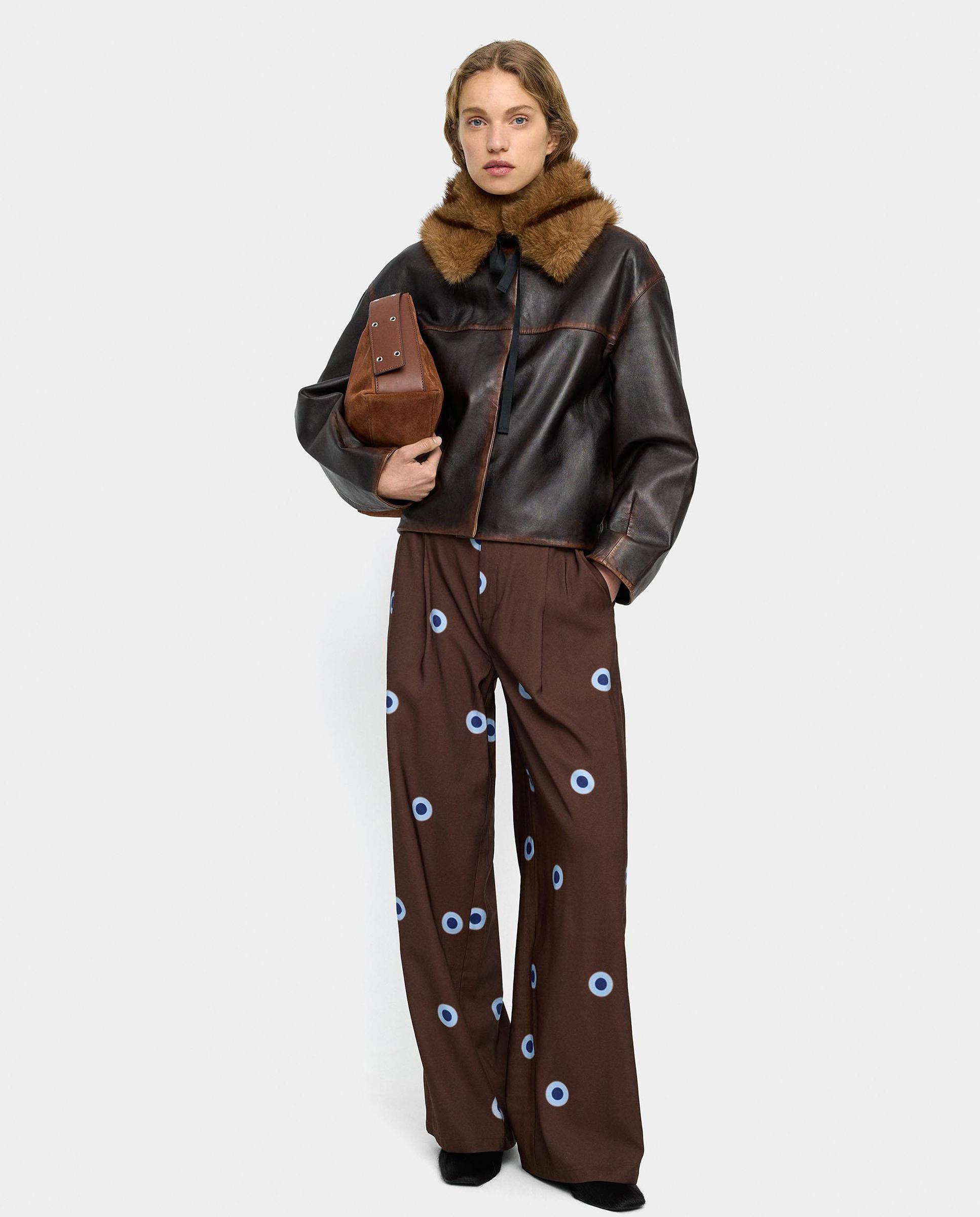 Parfois - Pantalón ancho de mujer con estampado de lunares.