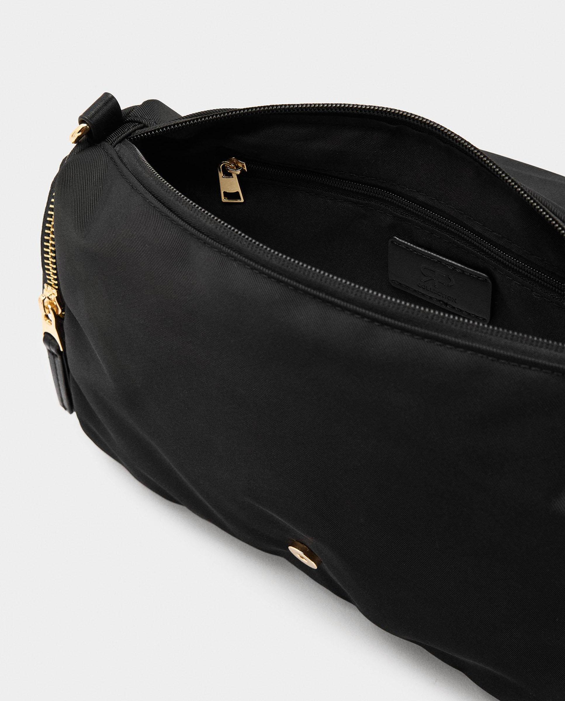 Bandolera de mujer con solapa y varios bolsillos con cierre de cremallera - Parfois - Negro Negro-4