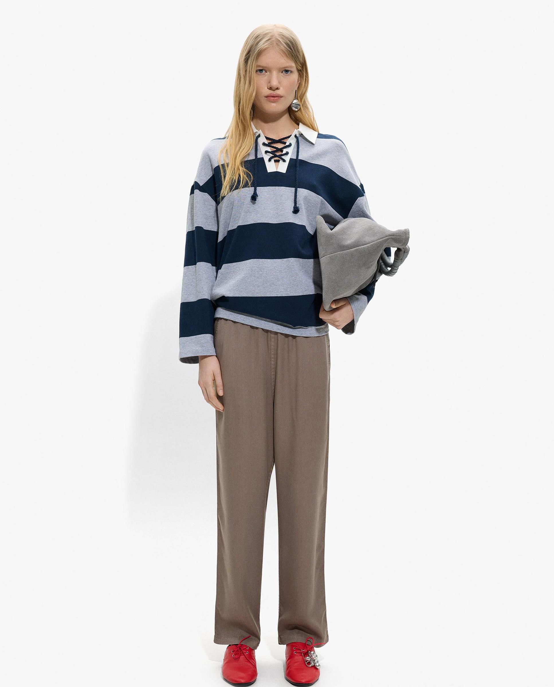 Parfois - Pantalones rectos de mujer 100% liocel con cintura elástica en liso.