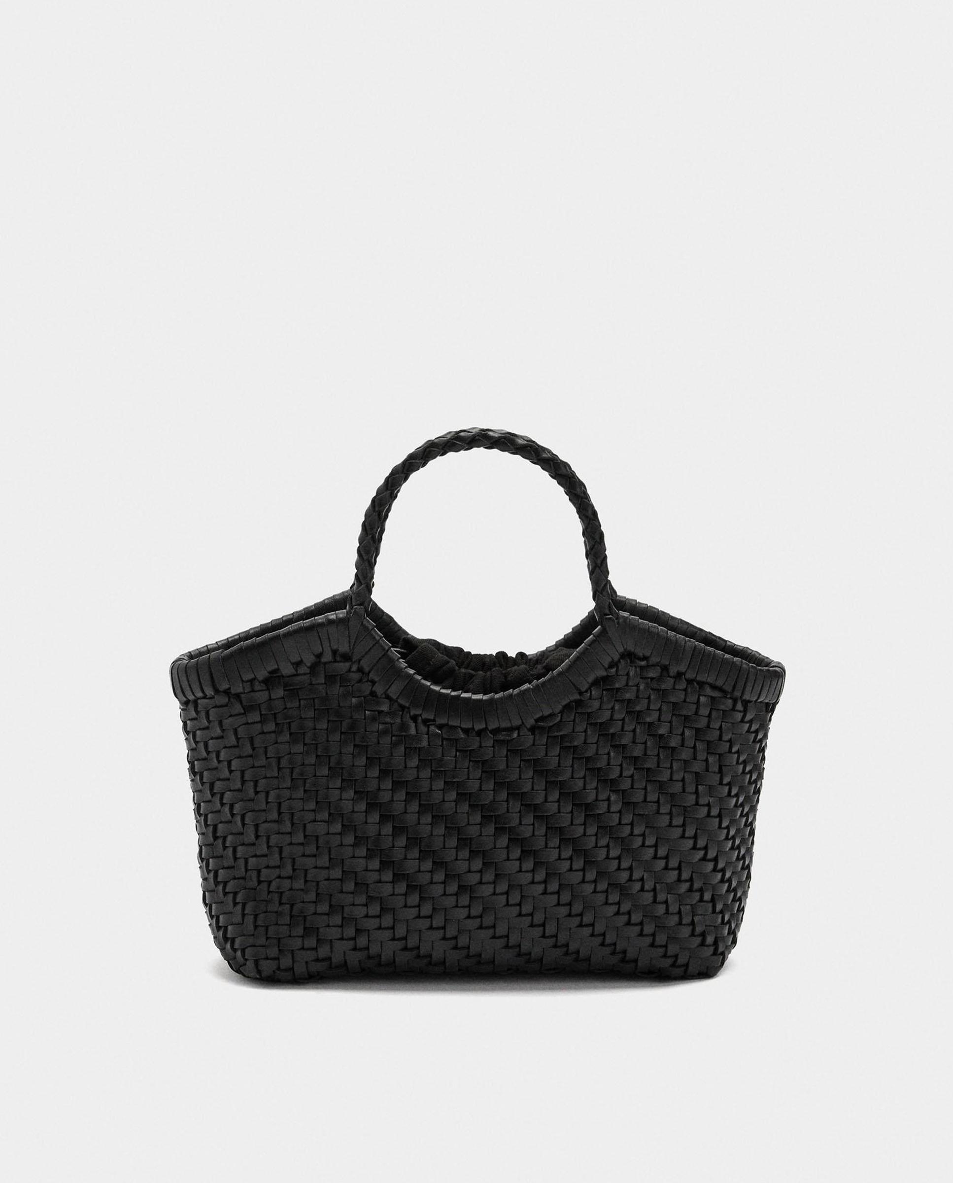 Imagen 0 de Bolso de mano trenzado estilo tote de piel con bolsa extraíble en liso Negro