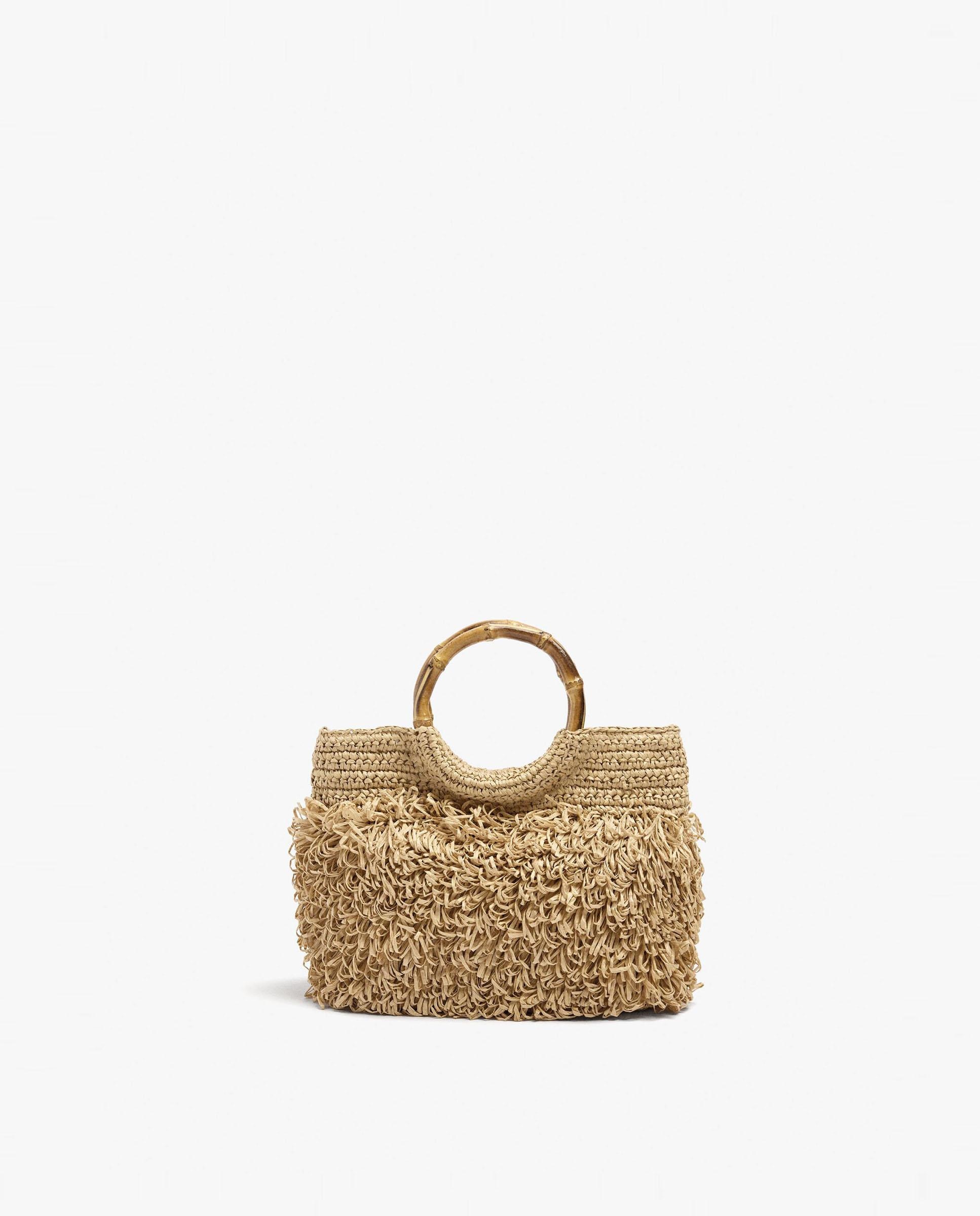 Bolso de fiesta convertible a bandolera efecto rafia con cierre de imán y flecos en liso - Parfois - Natural Natural-1