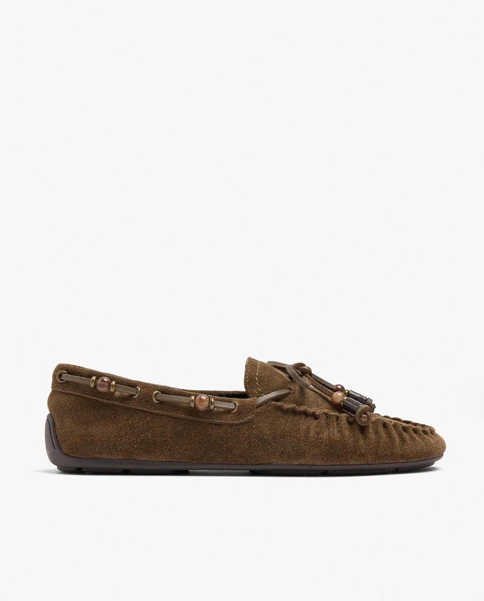 Parfois - Mocasines planos de mujer de piel con borlas decorativas en liso.