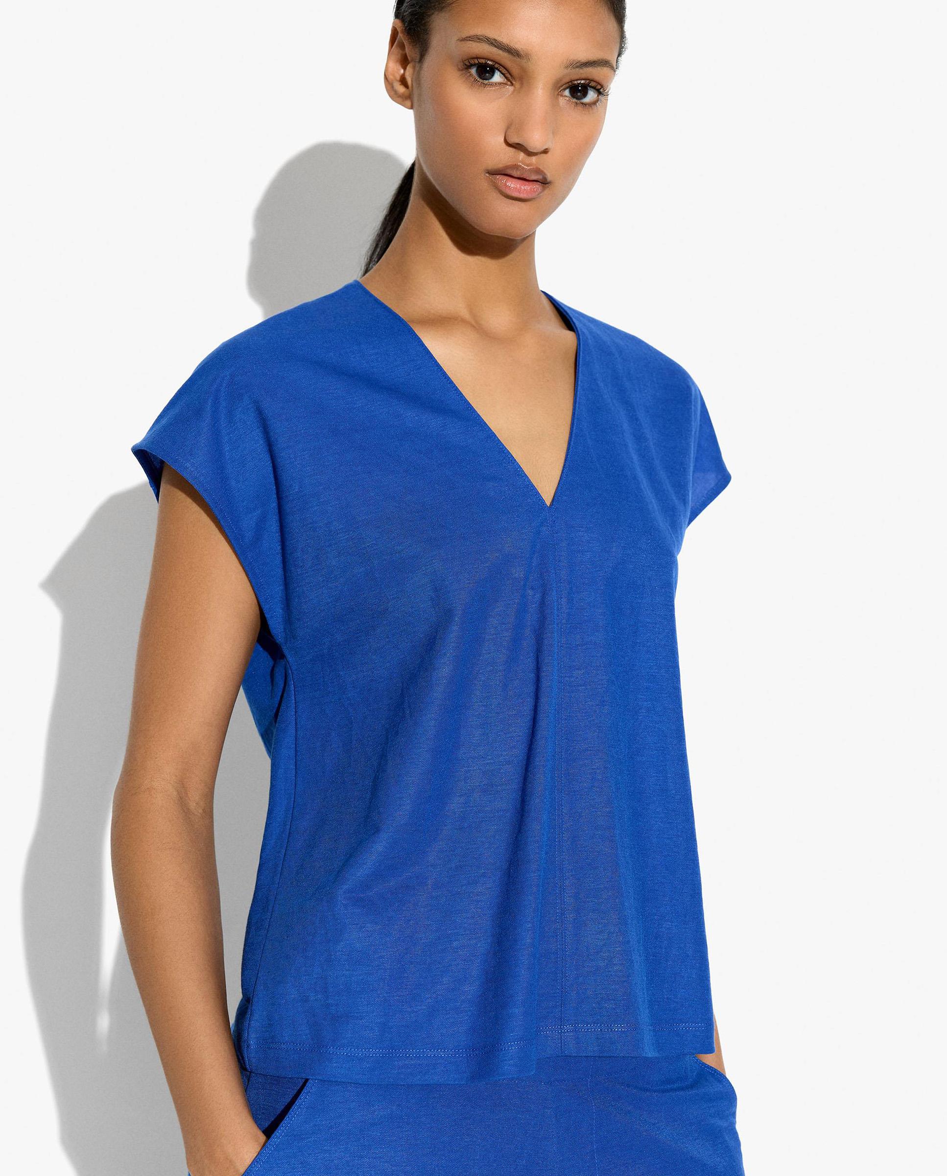 Parfois - Camiseta de mujer de manga corta con cuello pico en liso.