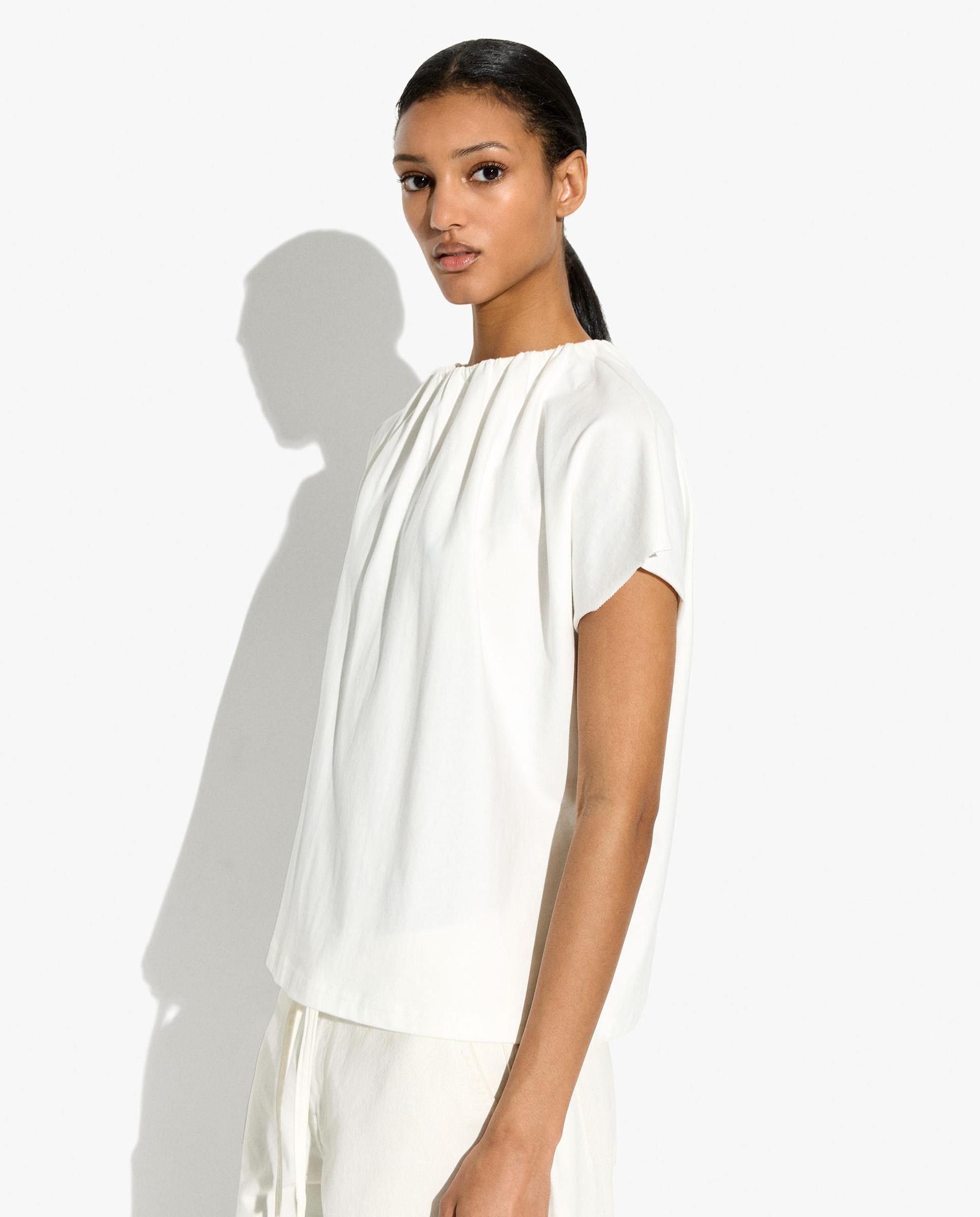 Parfois - Blusa de mujer 100% algodón con cuello redondo de pliegues.