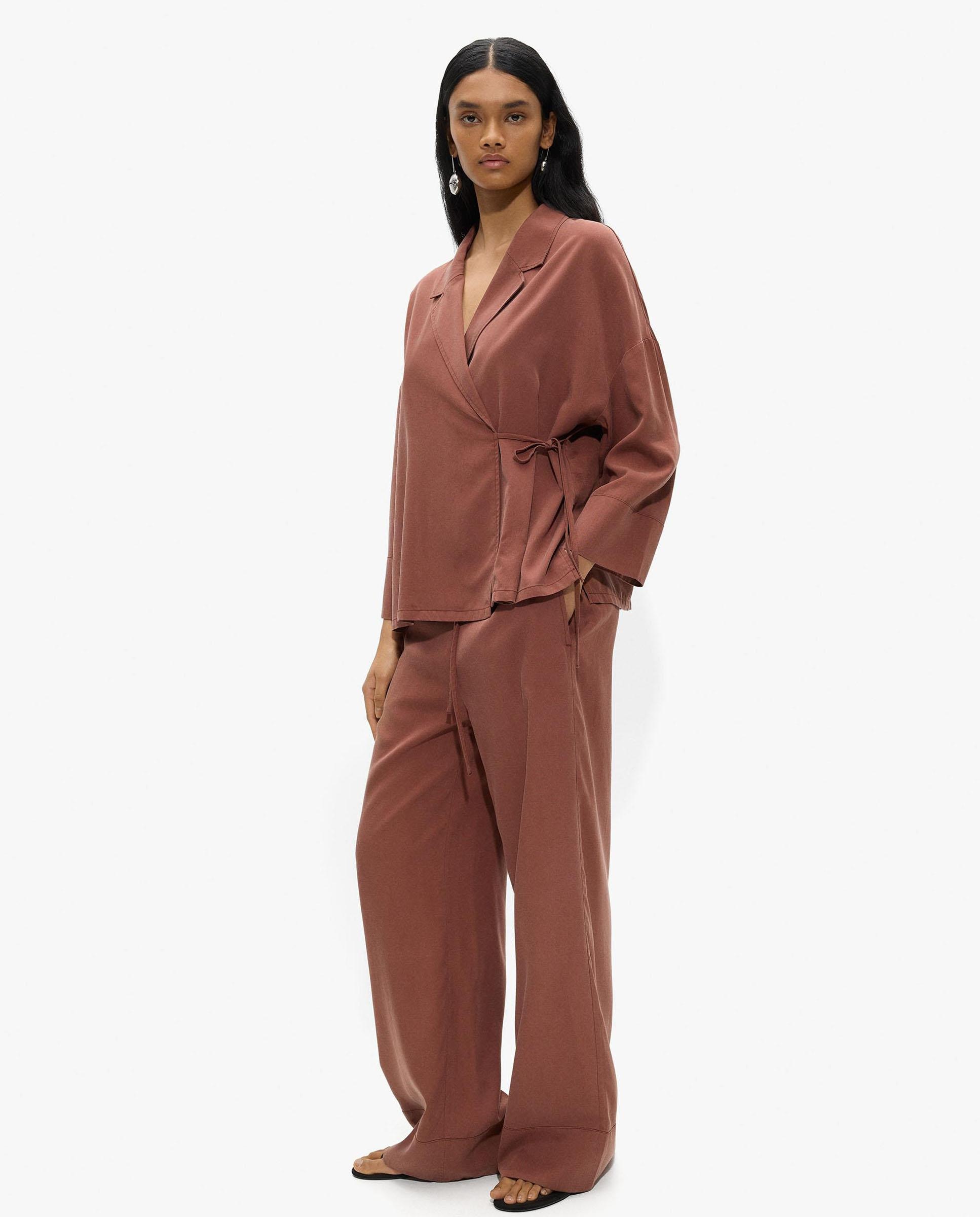 Parfois - Pantalones anchos de mujer 100% liocel con bolsillos laterales.