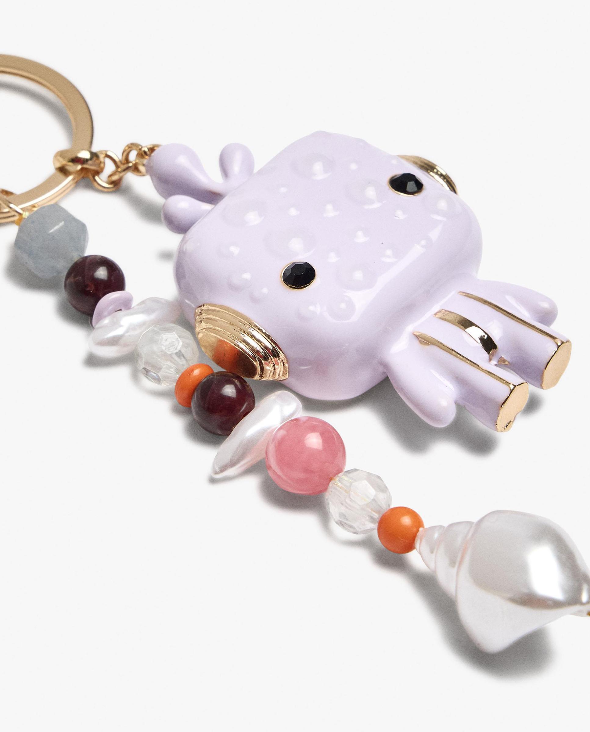 Llavero con charm de muñeco y signo del zodiaco acuario - Parfois - Multicolor Multicolor-3