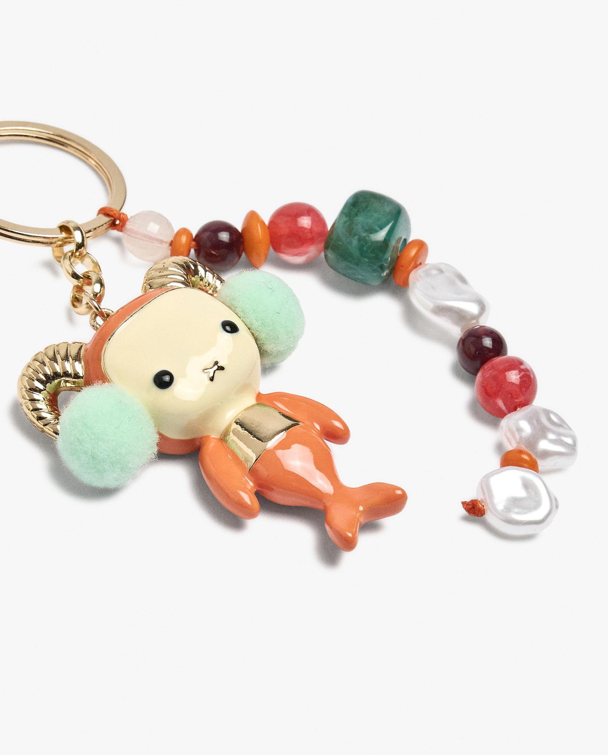 Llavero con charm de muñeco y signo del zodiaco capricornio - Parfois - Multicolor Multicolor-3