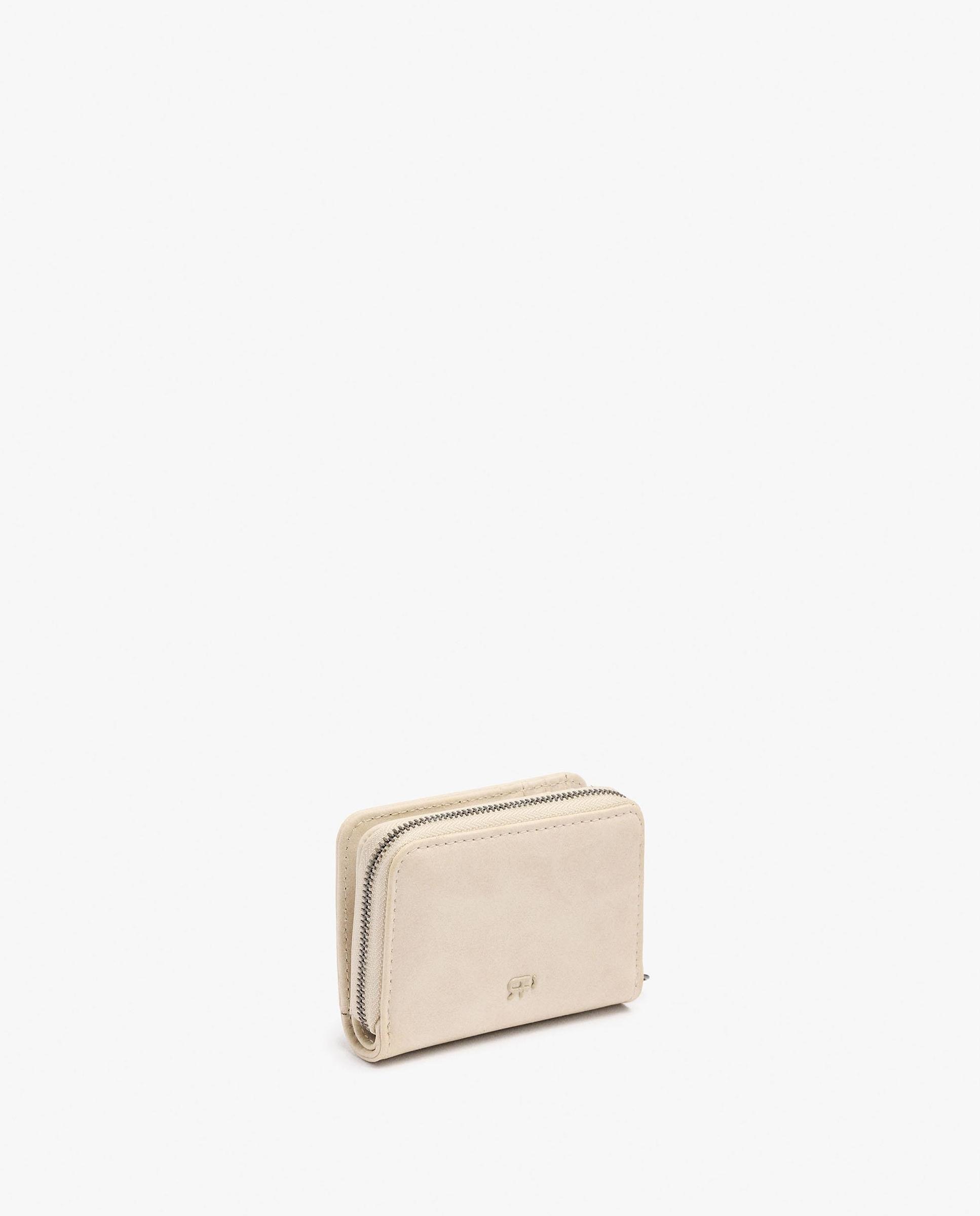 Cartera de mujer pequeña con tachuelas decorativas y cierre de cremallera en liso - Parfois - Crudo Crudo-2