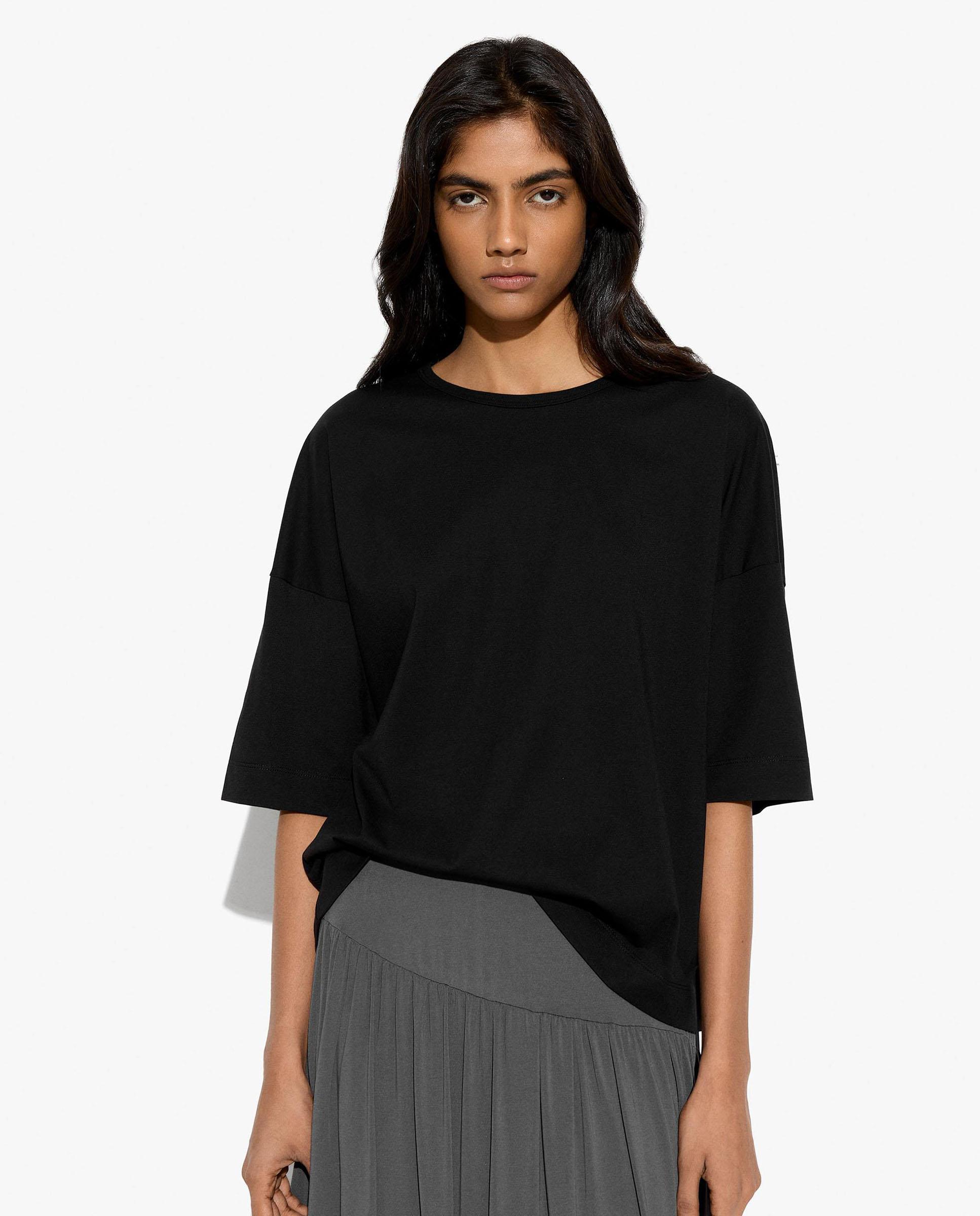Parfois - Camiseta de mujer de manga corta estilo oversize en liso.