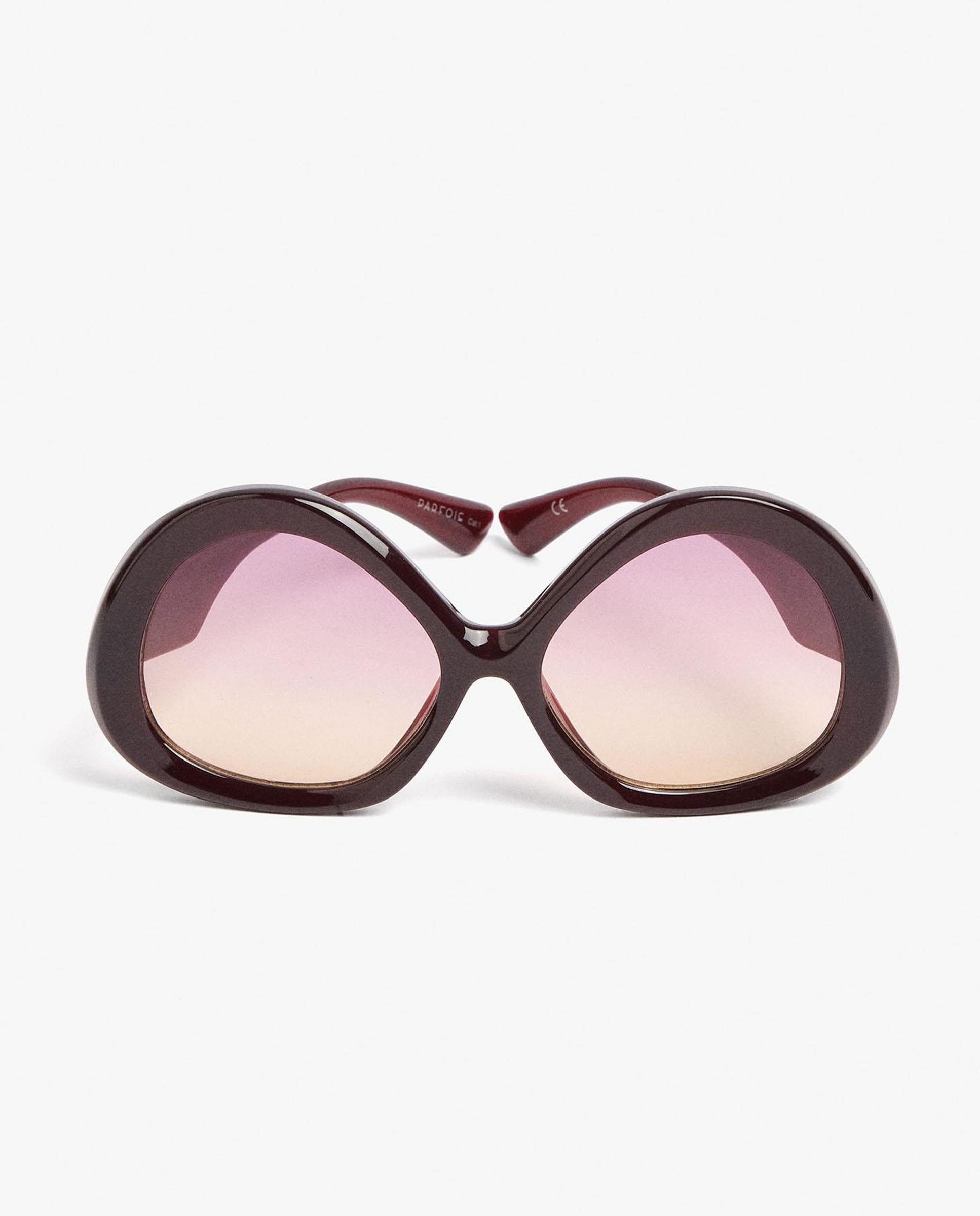 Gafas de sol de mujer con protección uv y forma redonda en liso