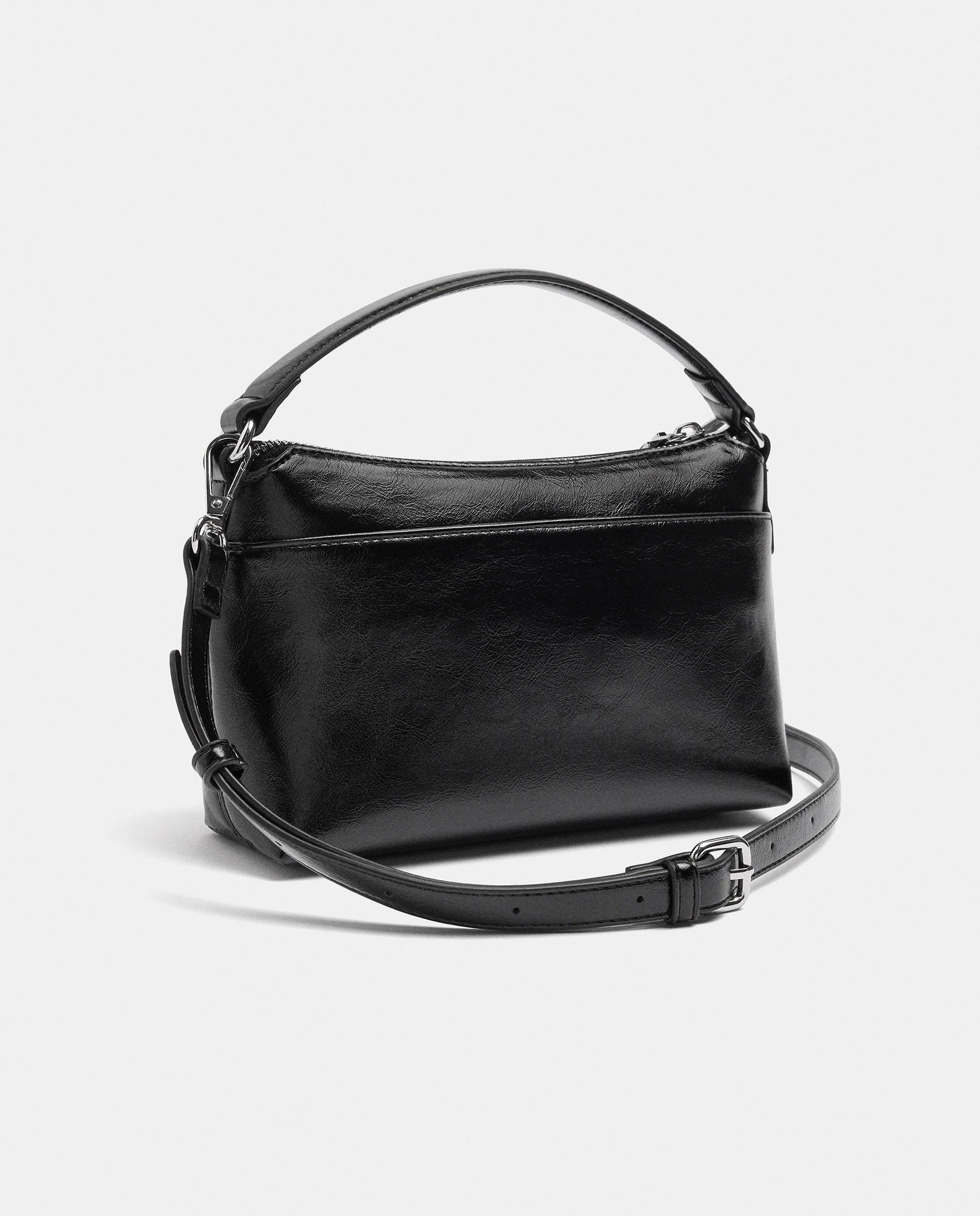 Bandolera de mujer con tachuelas y cierre de cremallera en liso - Parfois - Negro Negro-4