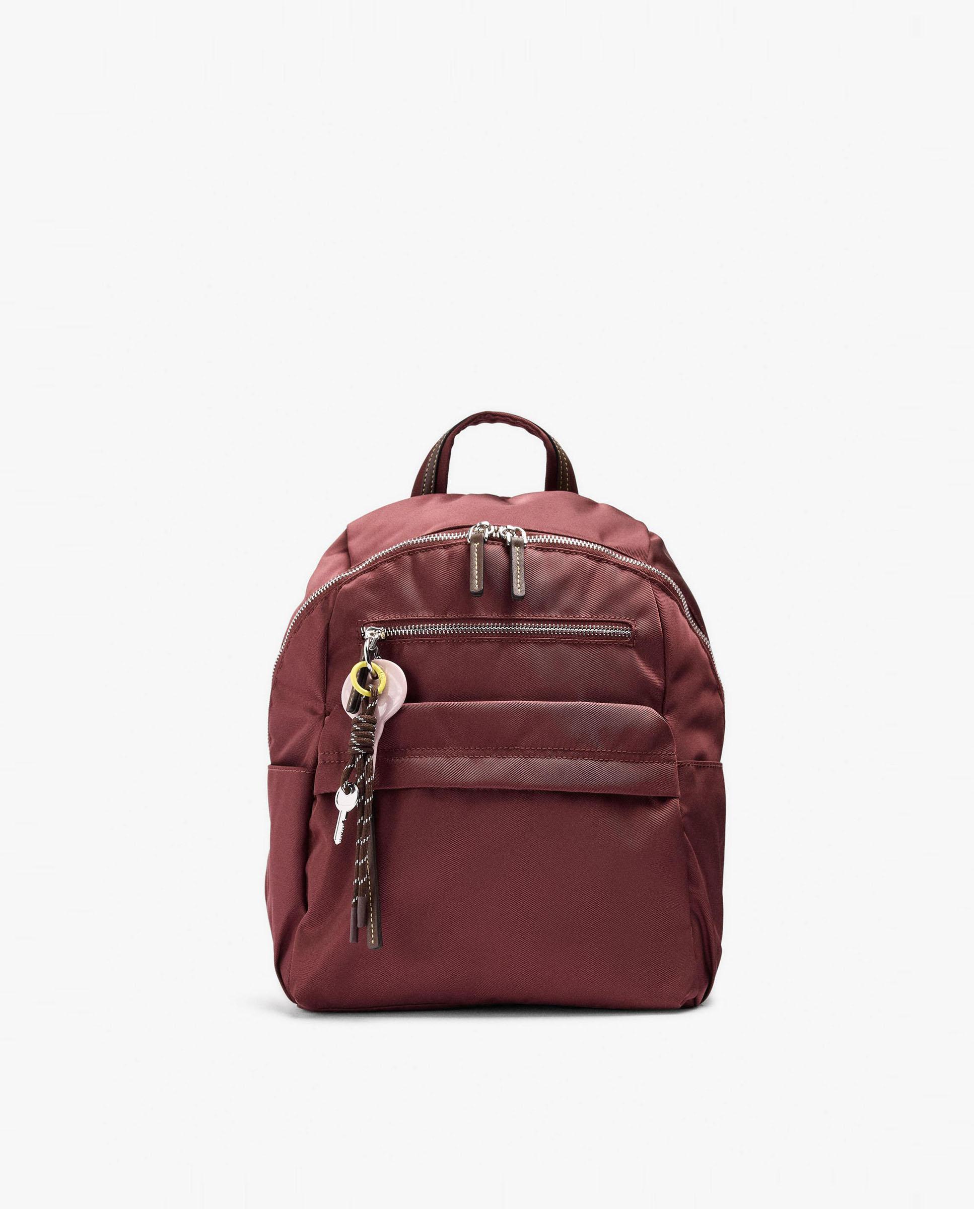 Mochila de mujer con varios compartimentos y cierre de cremallera con llavero extraíble en liso