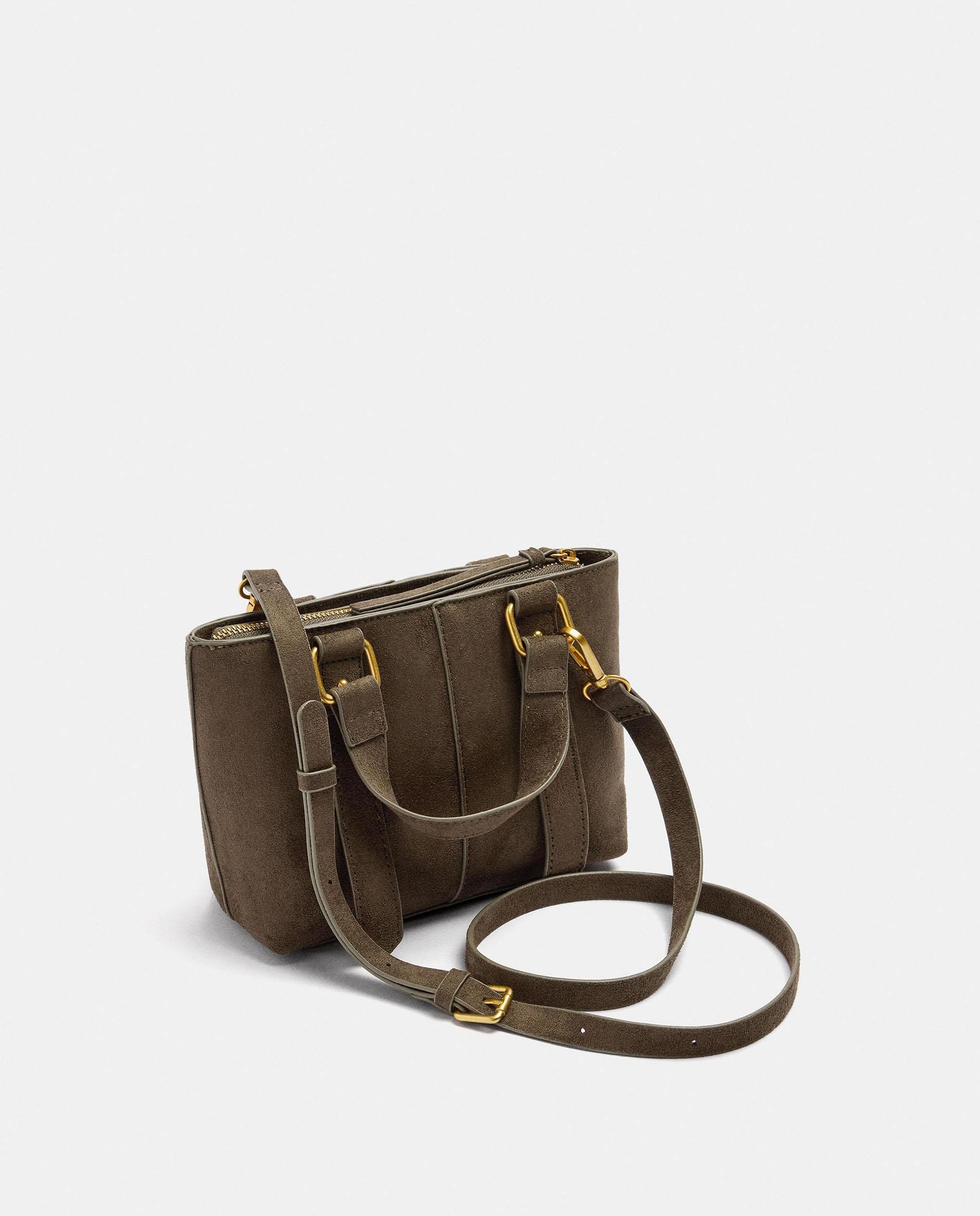 Bolso de mano estilo tote convertible a bandolera con cierre de cremallera y hebillas decorativas - Parfois - Kaki Kaki-2