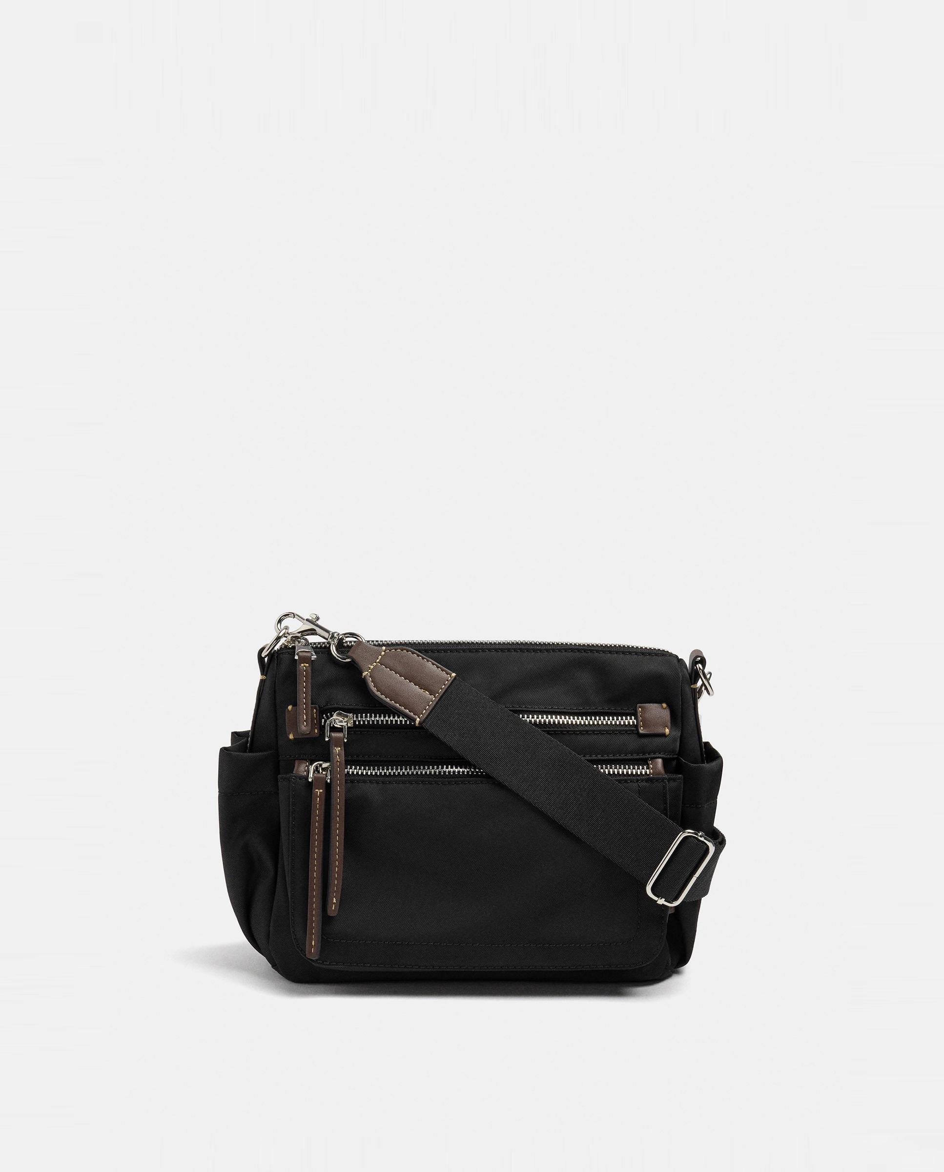 Bandolera de mujer con varios compartimentos y cierre de cremallera en liso - Parfois - Negro Negro-1