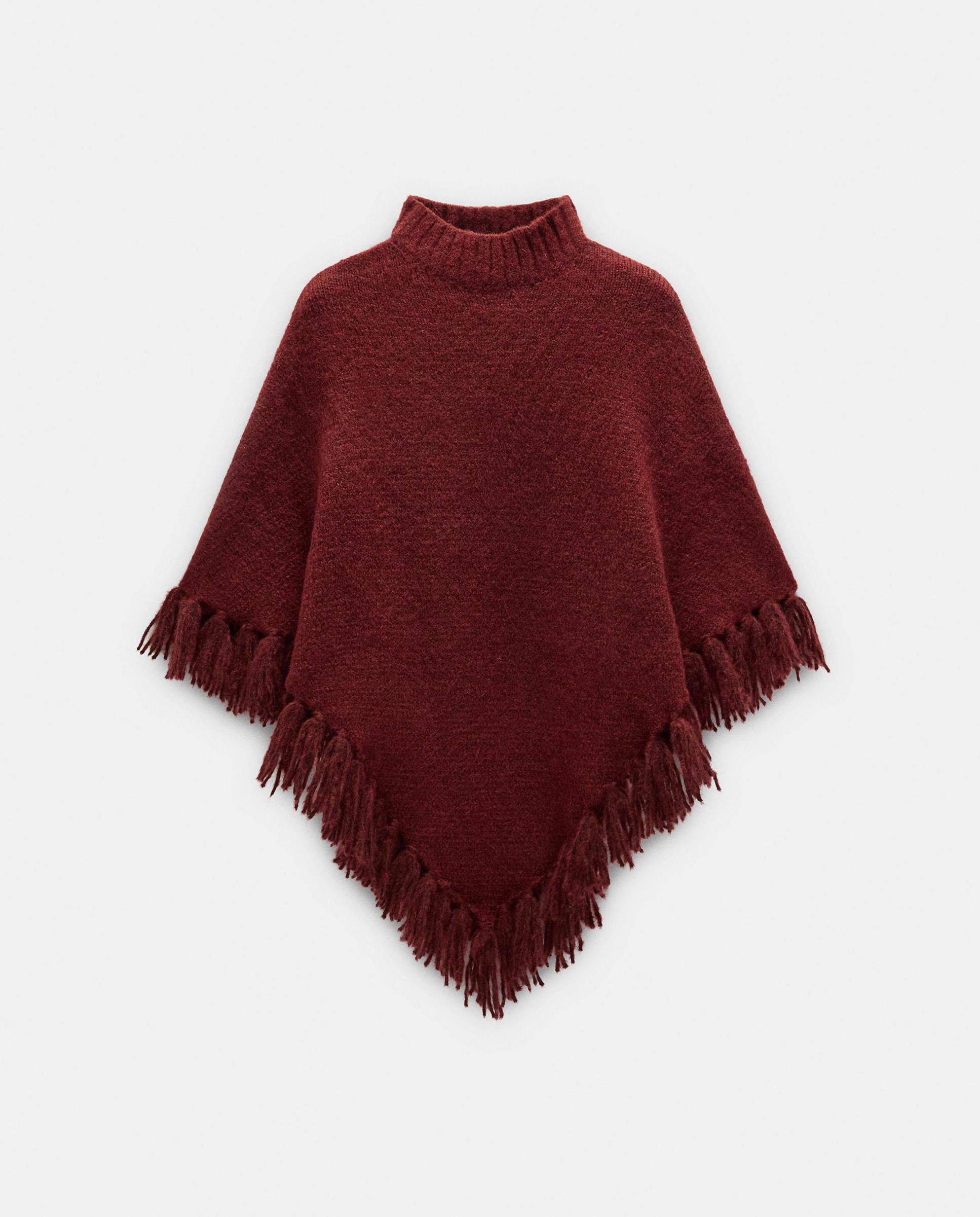 Imagen 0 de Capa de mujer estilo poncho con flecos en liso Burdeos
