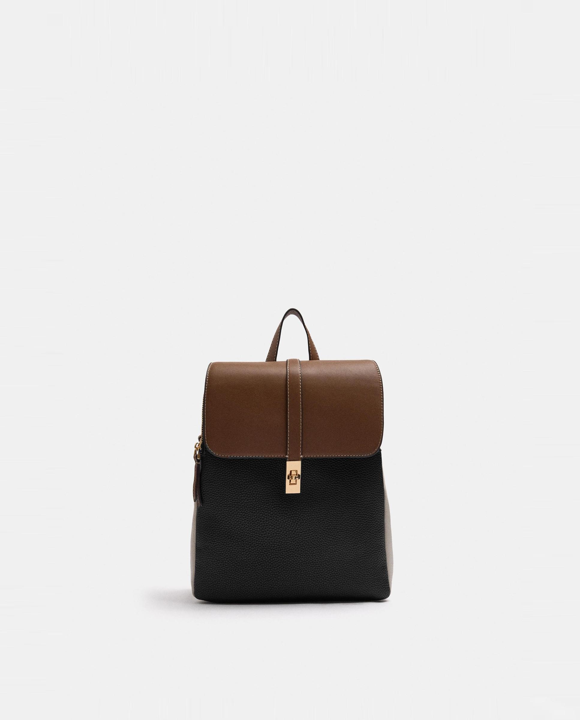 Mochila de mujer con solapa y cierre de botón en liso - Parfois - Negro Negro-1