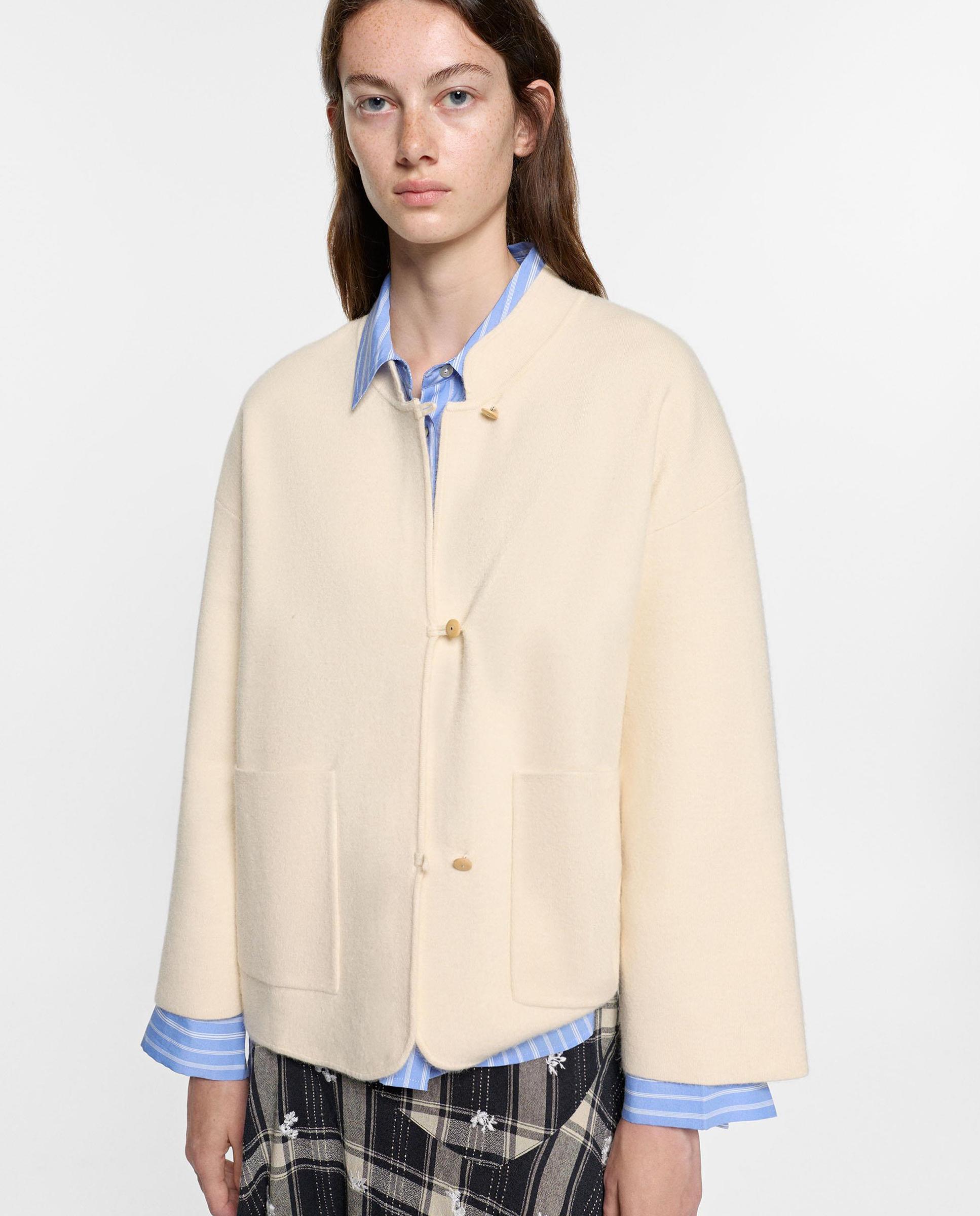 Imagen 0 de Chaqueta de mujer de punto con botones Crudo