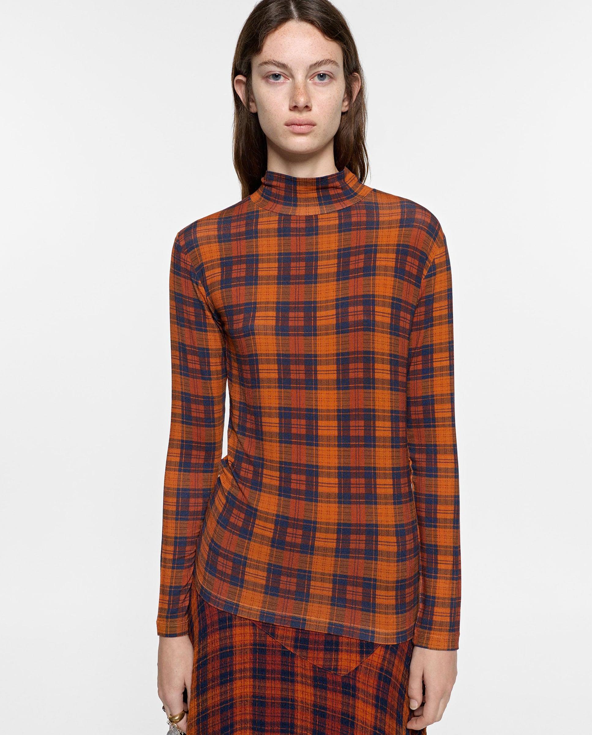 Imagen 0 de Jersey de mujer con cuello alto y estampado de cuadros Naranja