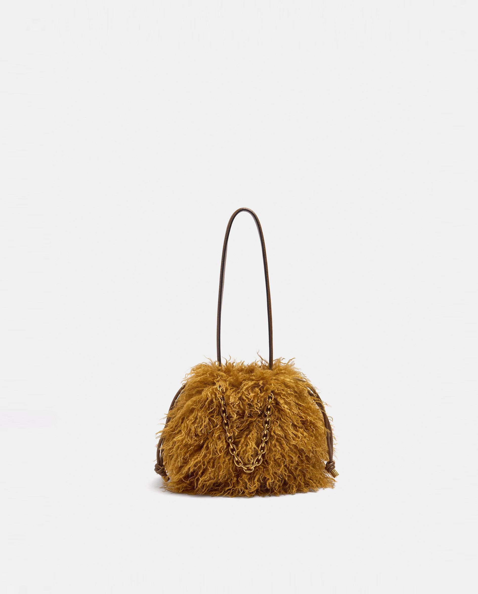 Bandolera de mujer con pelito exterior en liso - Parfois - Mostaza Mostaza-1