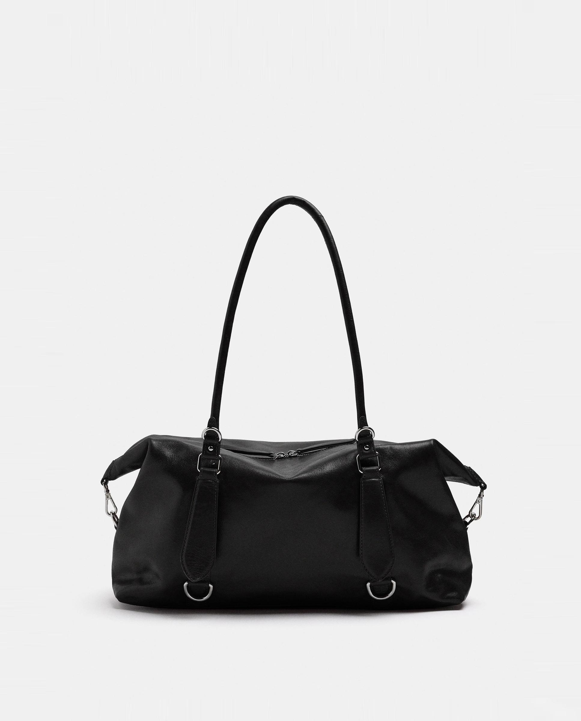 Imagen 0 de Shopper 100% piel con hebillas decorativas y cierre de cremallera en liso Negro