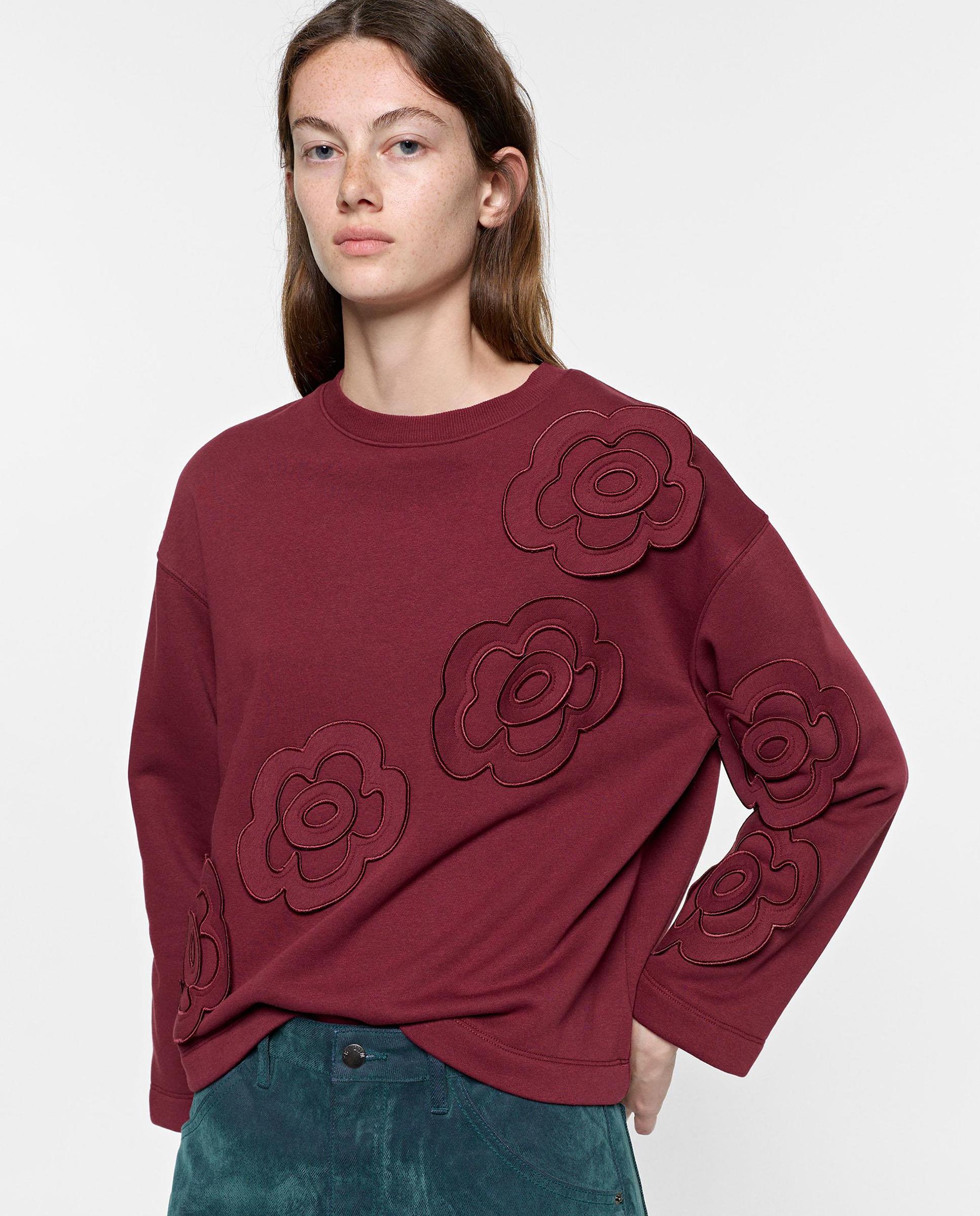 Imagen 0 de Jersey de mujer sin capucha con flores bordadas Burdeos