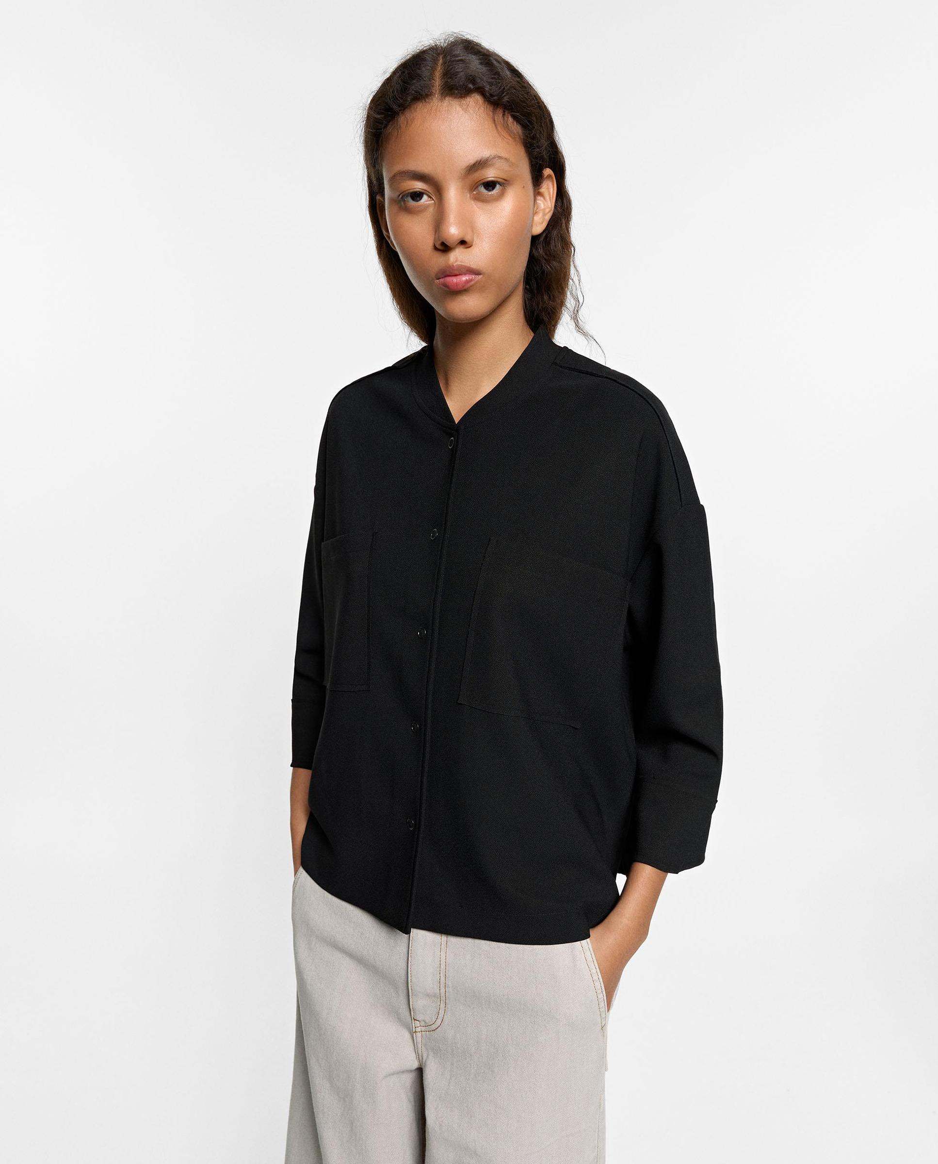 Imagen 0 de Chaqueta de mujer lisa con botones Negro