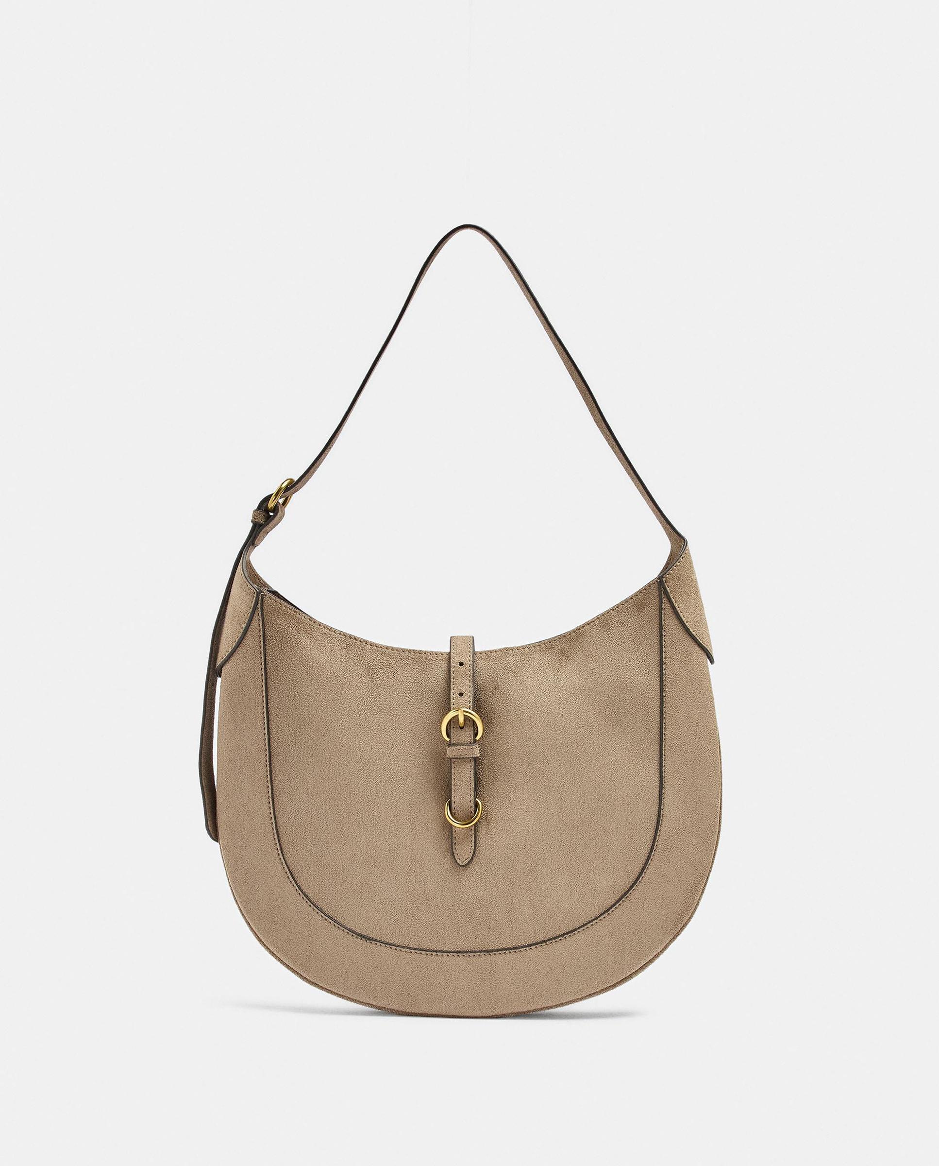 Imagen 1 de Bolso de hombro ovalado con tira y cierre de hebilla Beige