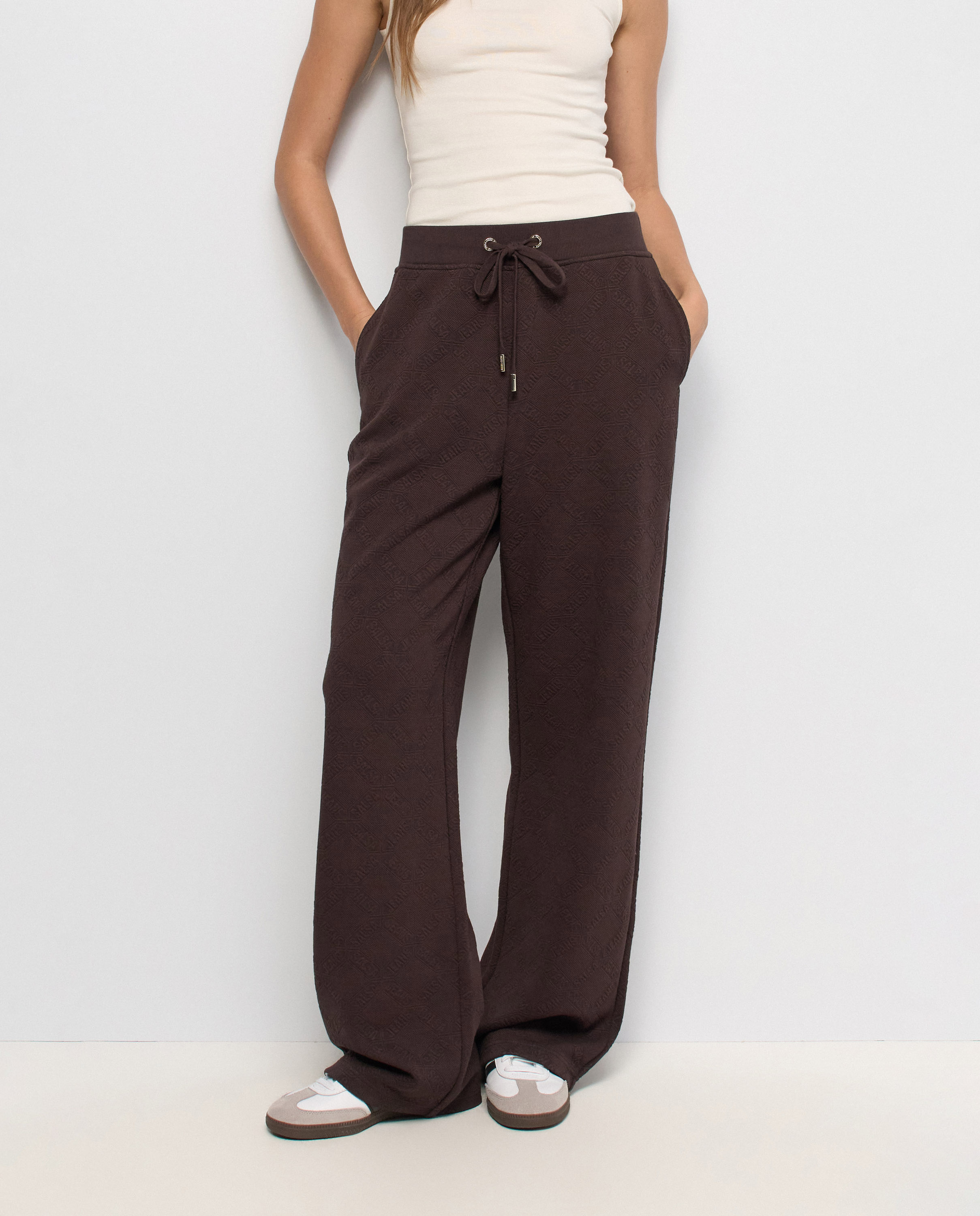 Imagen 0 de Pantalones jogger con jacquard de mujer Marrón