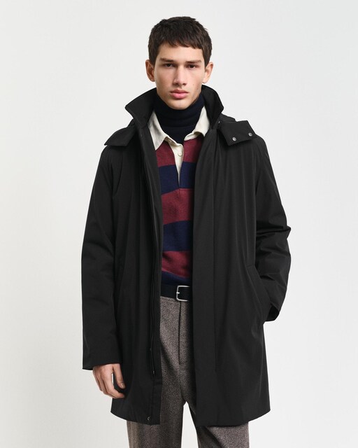 Imagen 0 de Abrigo de hombre largo con diseño acolchado