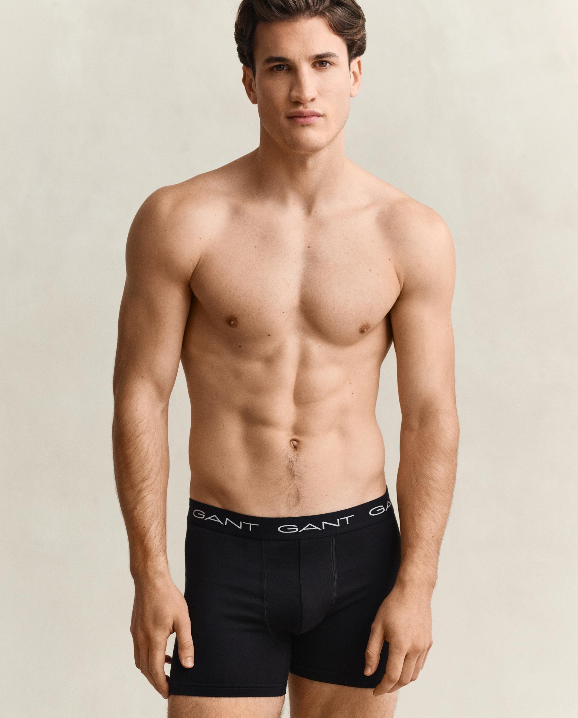 Imagen 0 de Pack de tres bóxers de punto de hombre en colores lisos y logotipos gant Negro