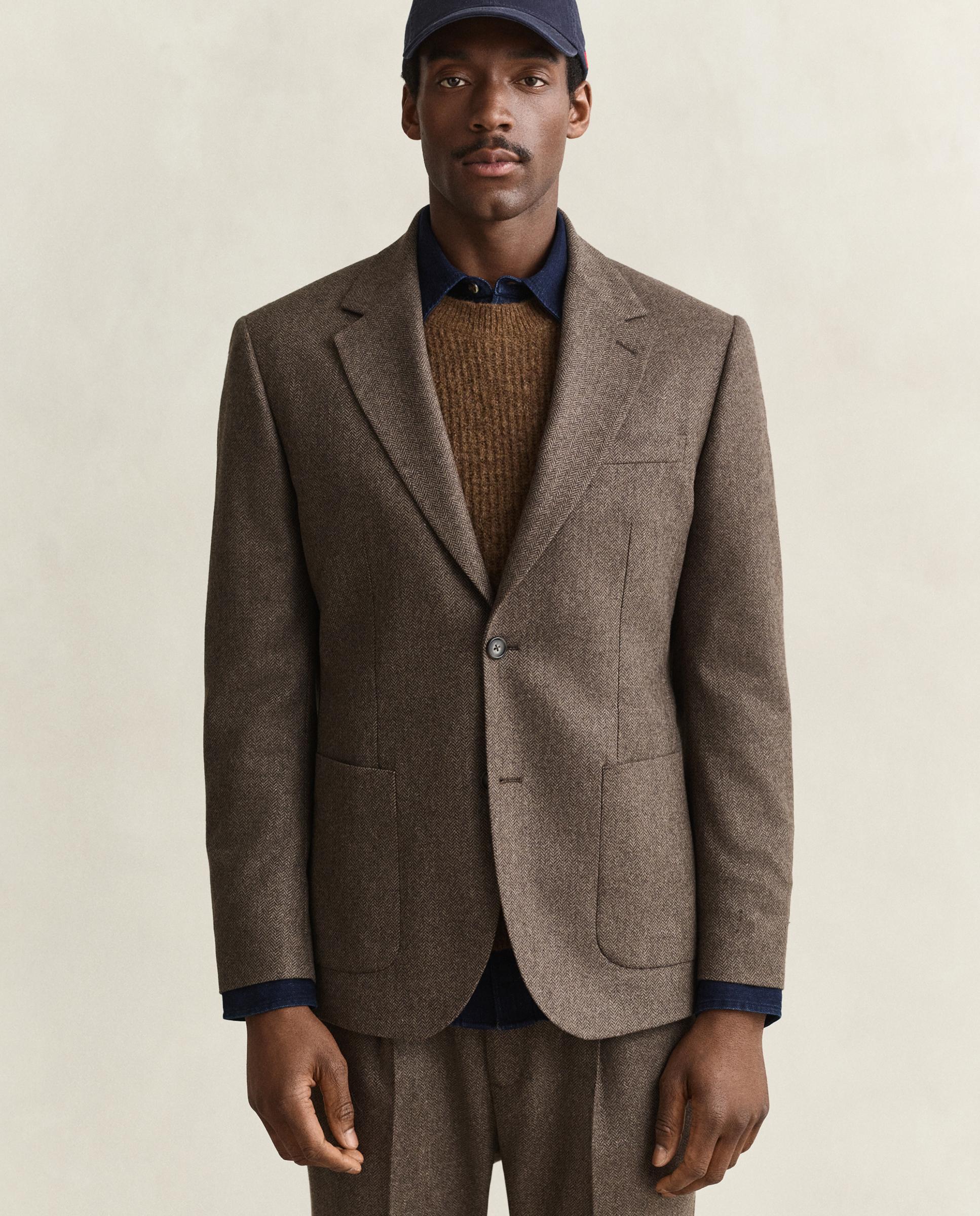 Imagen 0 de Chaqueta de traje de hombre con diseño de espiga y cierre de dos botones Marrón