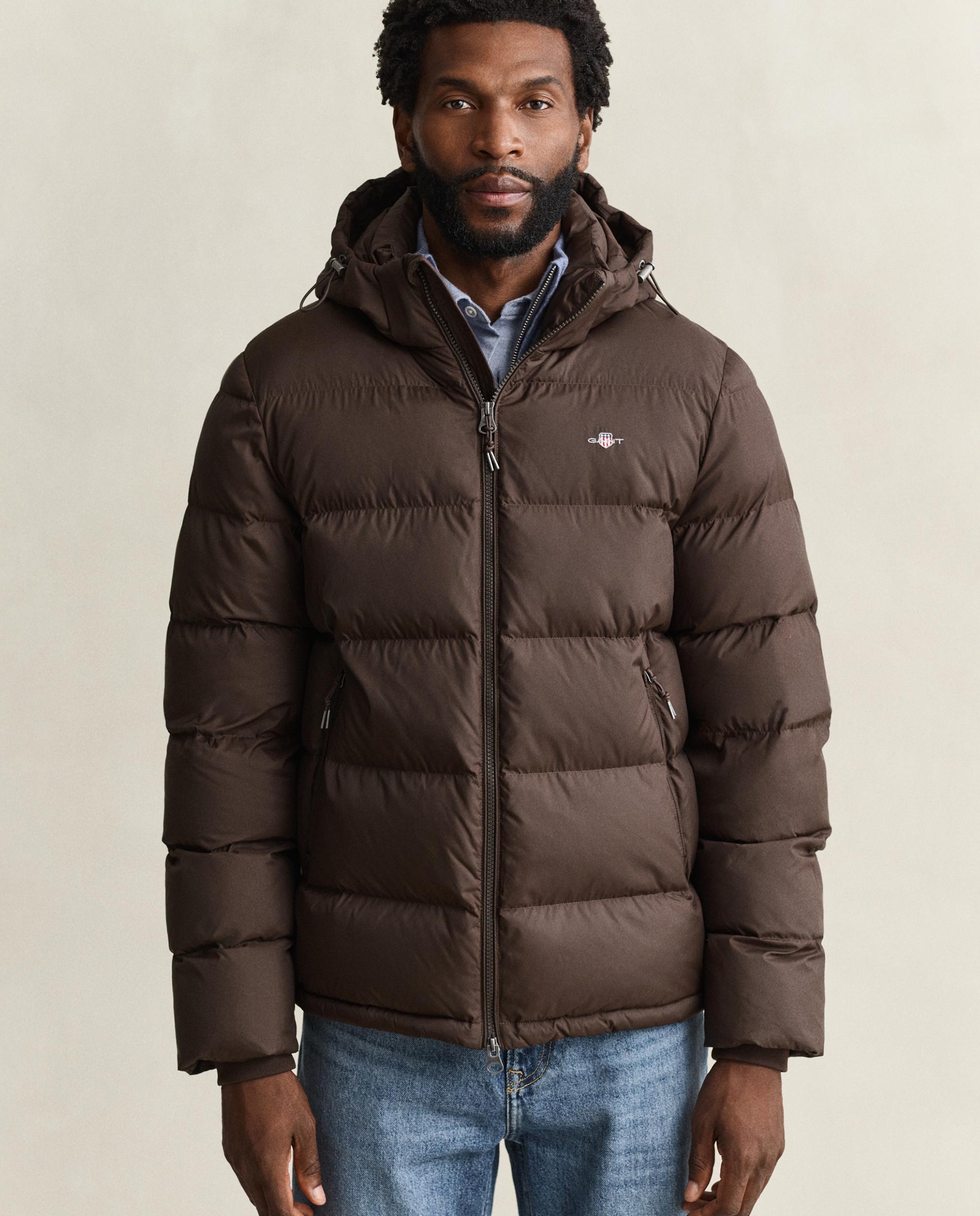 Imagen 0 de Plumifero de hombre impermeable con capucha Marrón