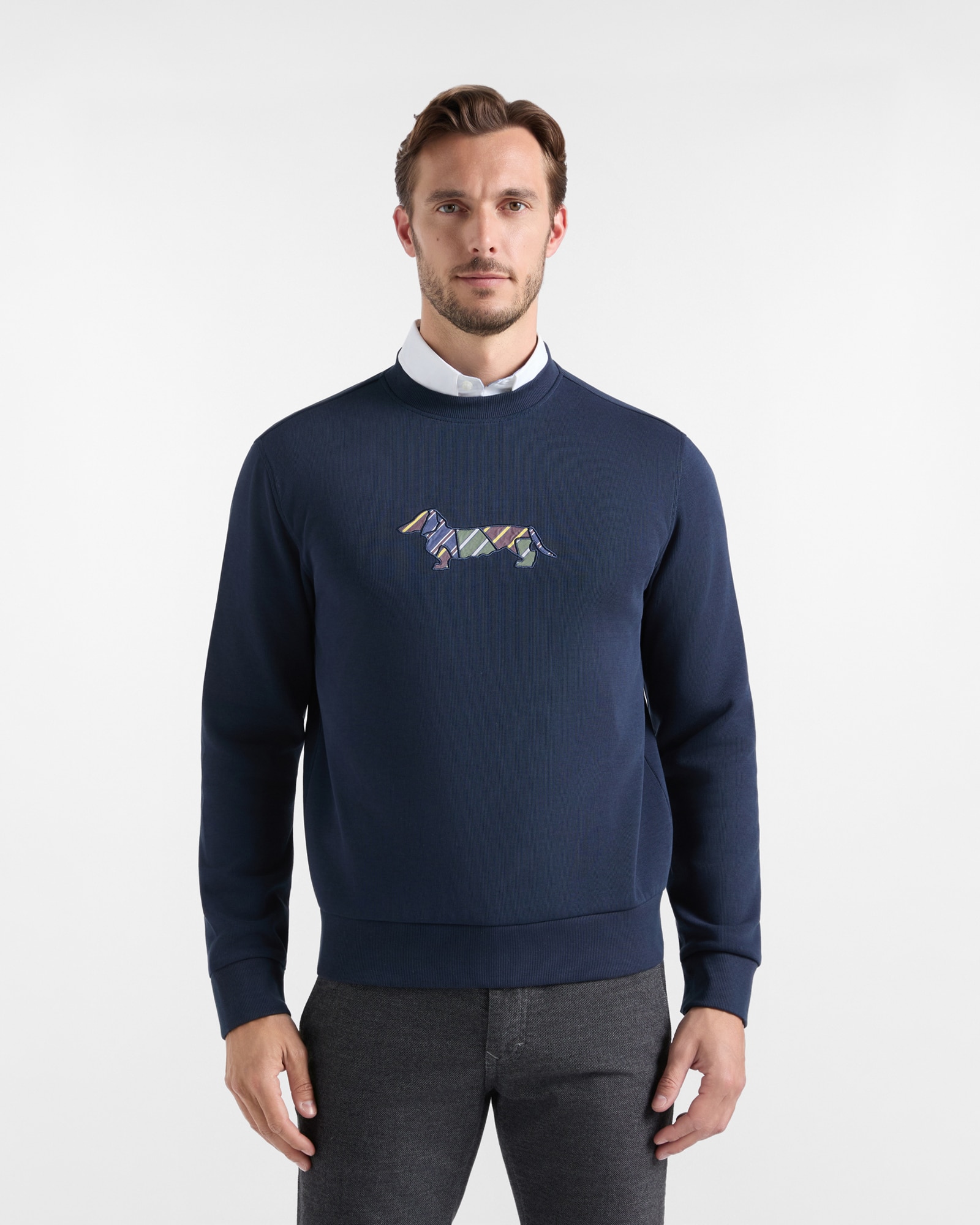 Imagen 1 de Sudadera de hombre cuello redondo en canalé azul con parche estilo regimental Azul marino