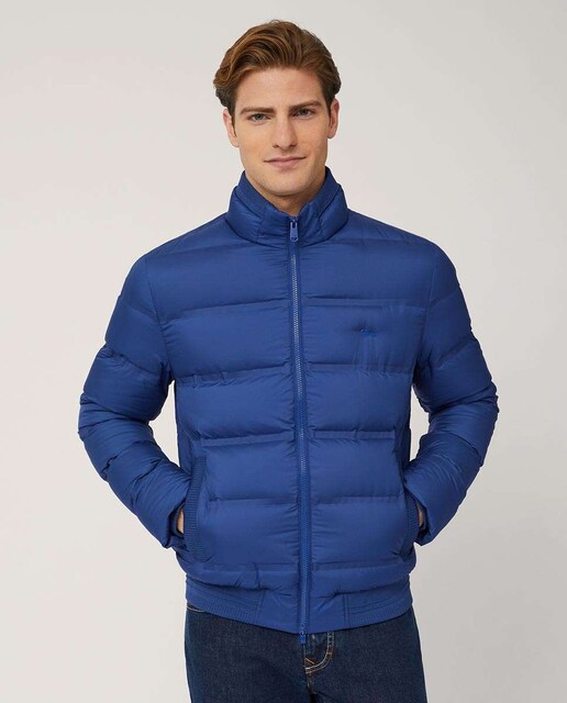 Imagen 0 de Chaqueta deportiva de hombre color azul marino tipo bómber acolchada