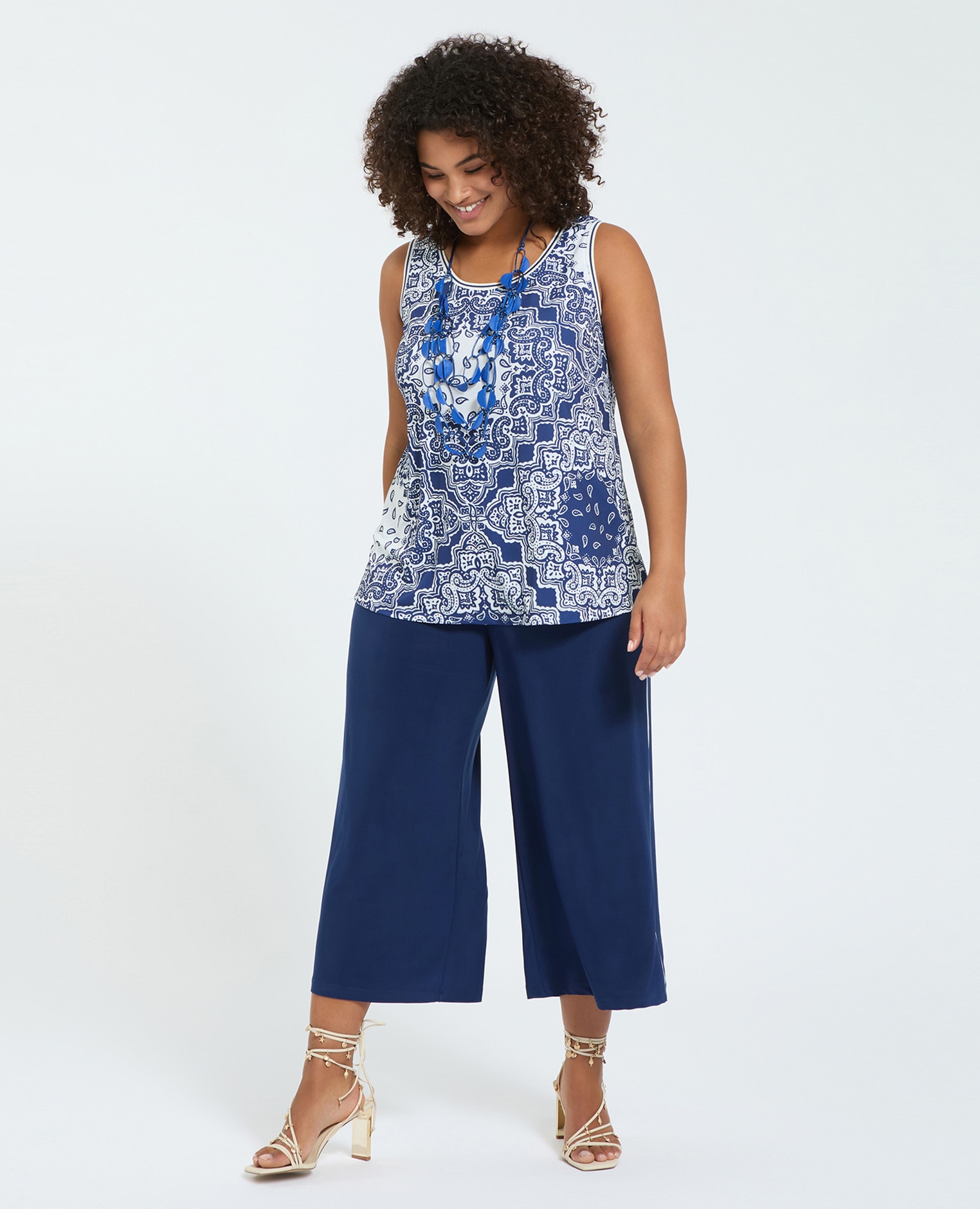 Fiorella Rubino - Pantalones de mujer cropped de punto cierre con cordón ajustable y perfiles laterales en contraste.