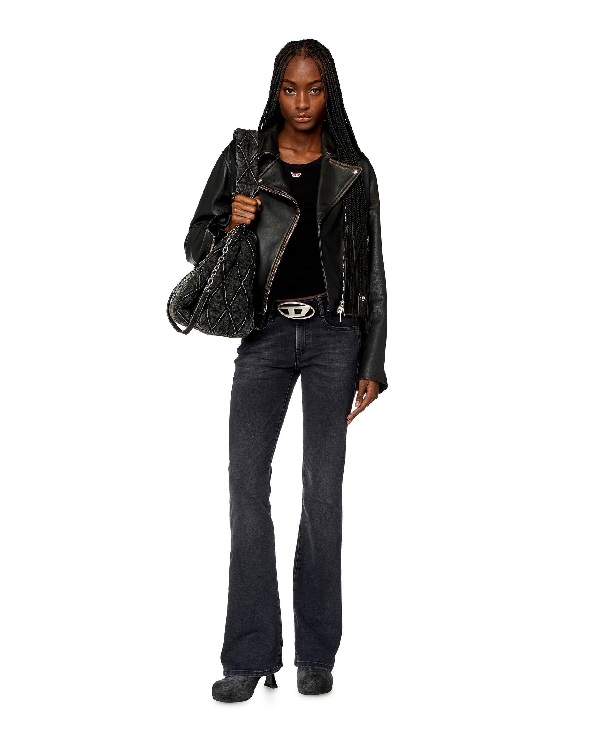 Diesel - Vaquero campana de mujer con cintura baja estilo bootcut.