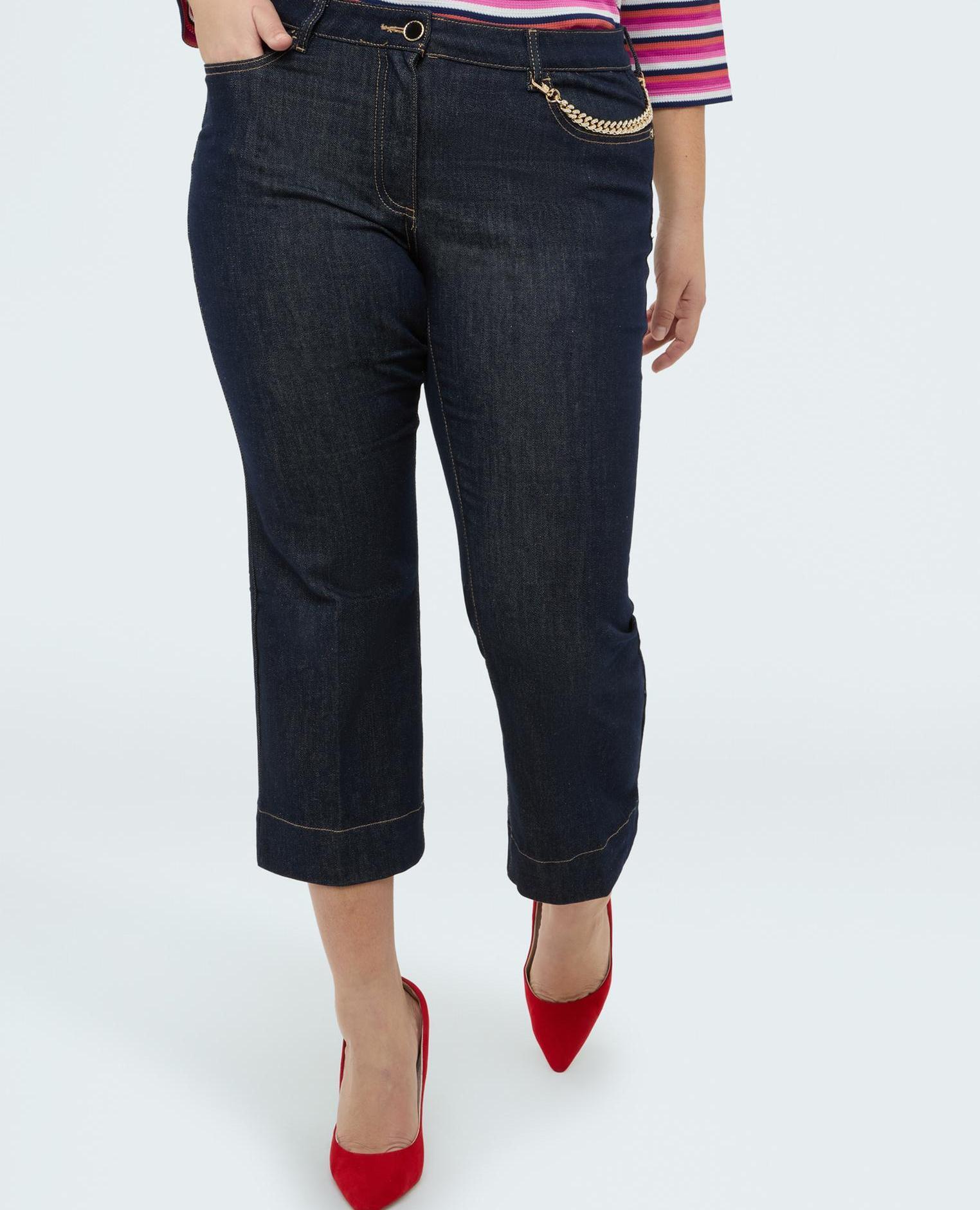 Fiorella Rubino - Vaqueros de mujer kick flare con cadenita decorativa.