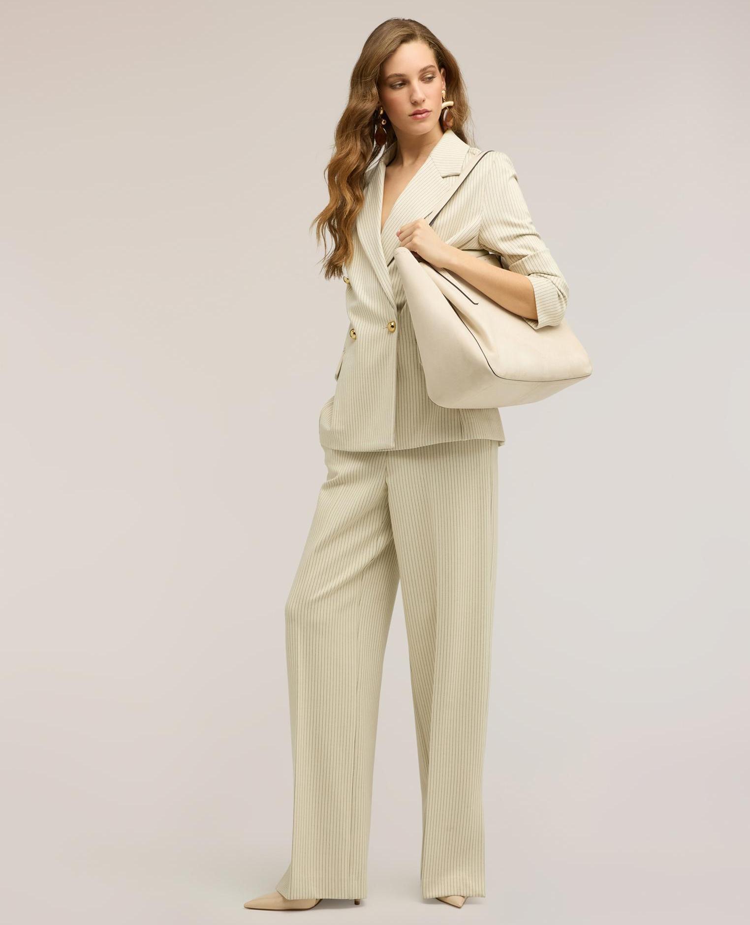Motivi - Pantalones de mujer palazzo en punto milano a rayas.