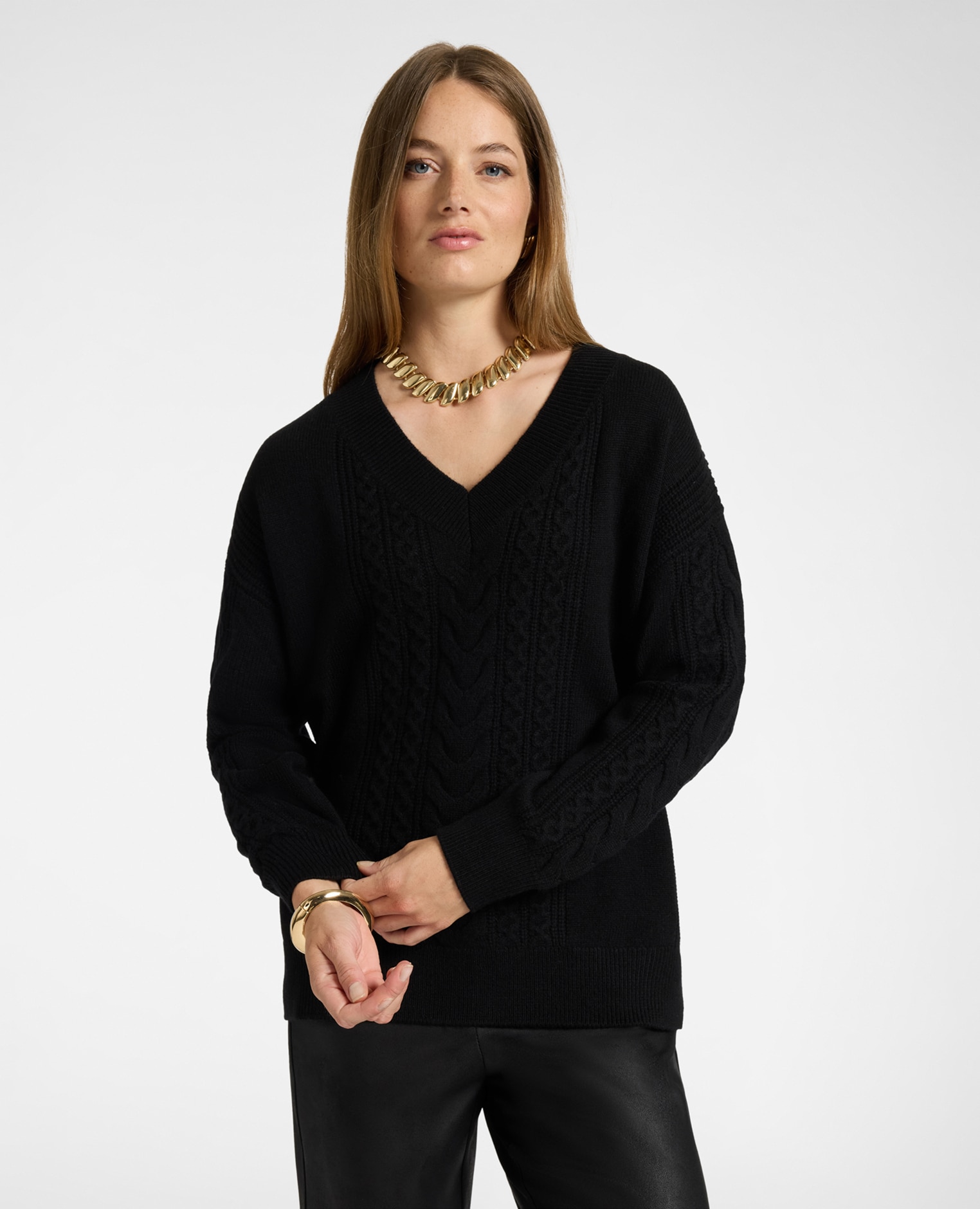 Imagen 0 de Jersey de mujer de pura lana con trenzas ajuste boxy y largo medio Negro