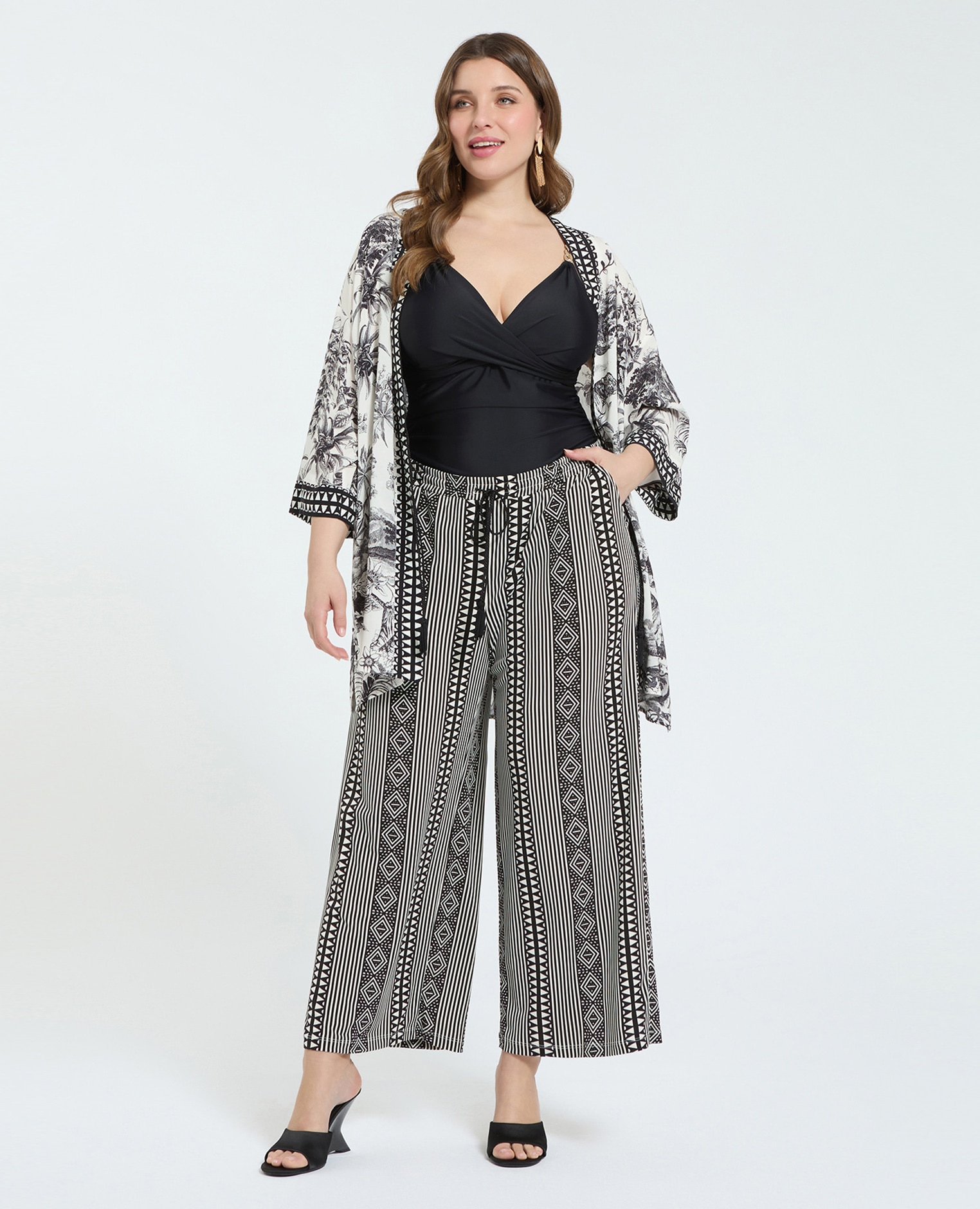 Pantalones de mujer palazzo de punto cintura elástica con cordón y borlas decorativas bolsillos laterales - Fiorella Rubino - Negro Negro-1