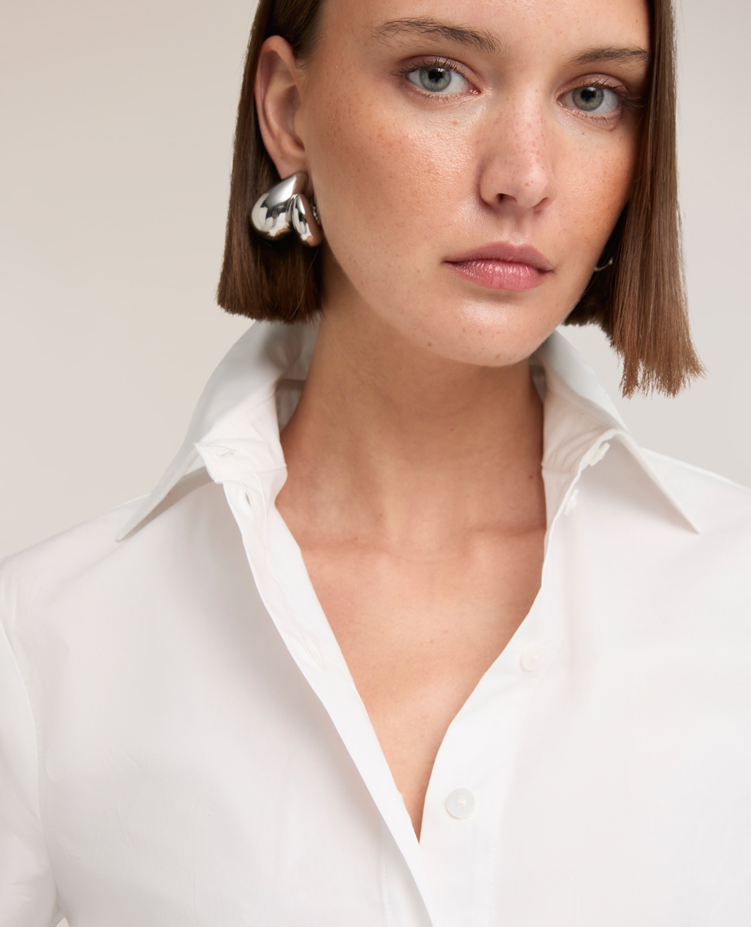Camisa de mujer boxy de popelín abertura frontal con botonadura a la vista - Motivi - Blanco Blanco-4